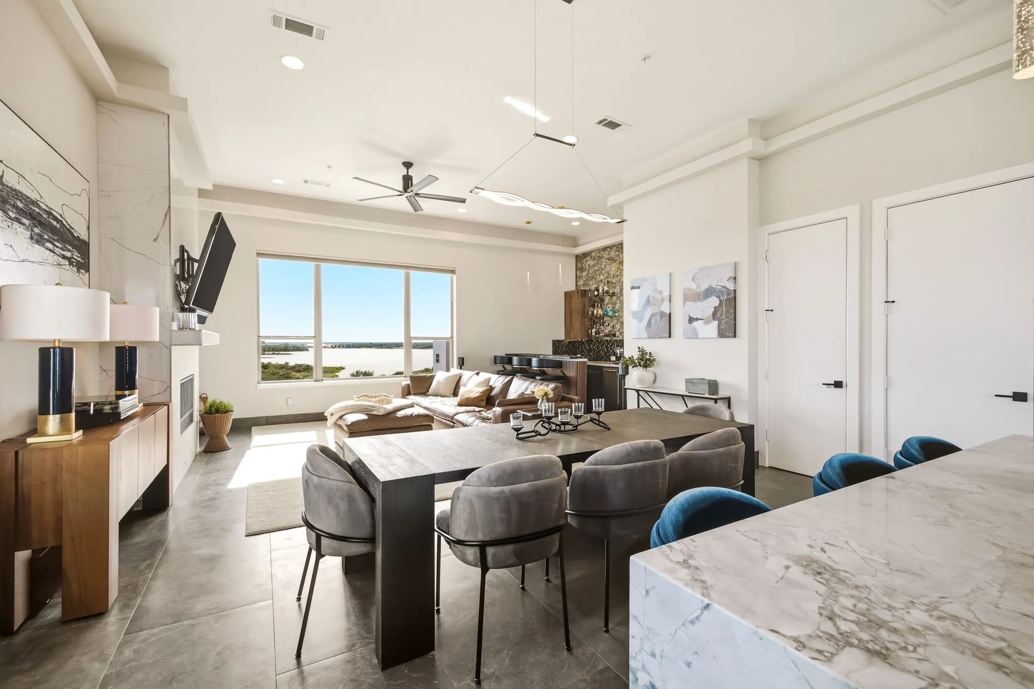 Open concept kitchen, dining, living, and bar