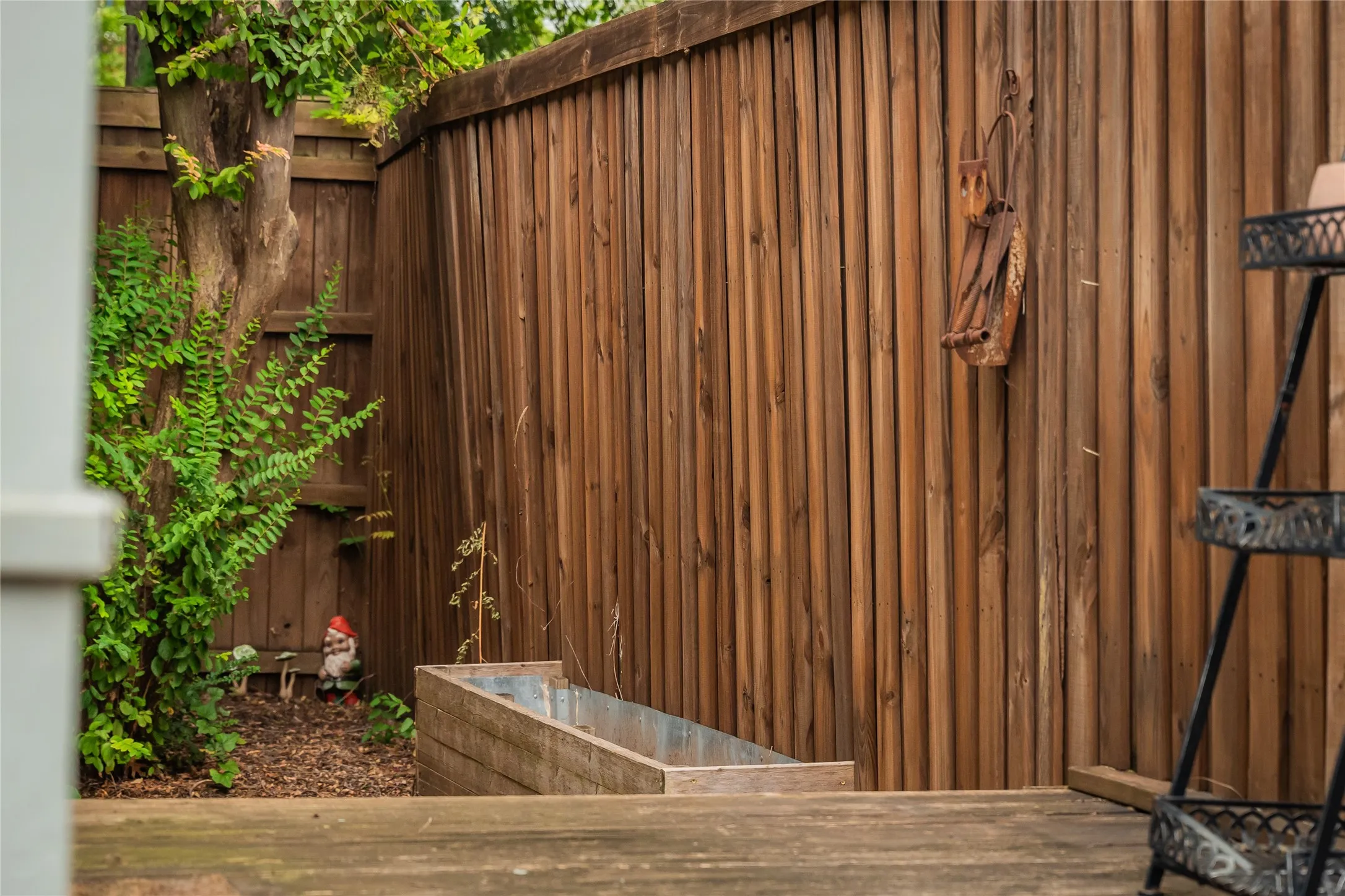 Side porch off mudroom with garden