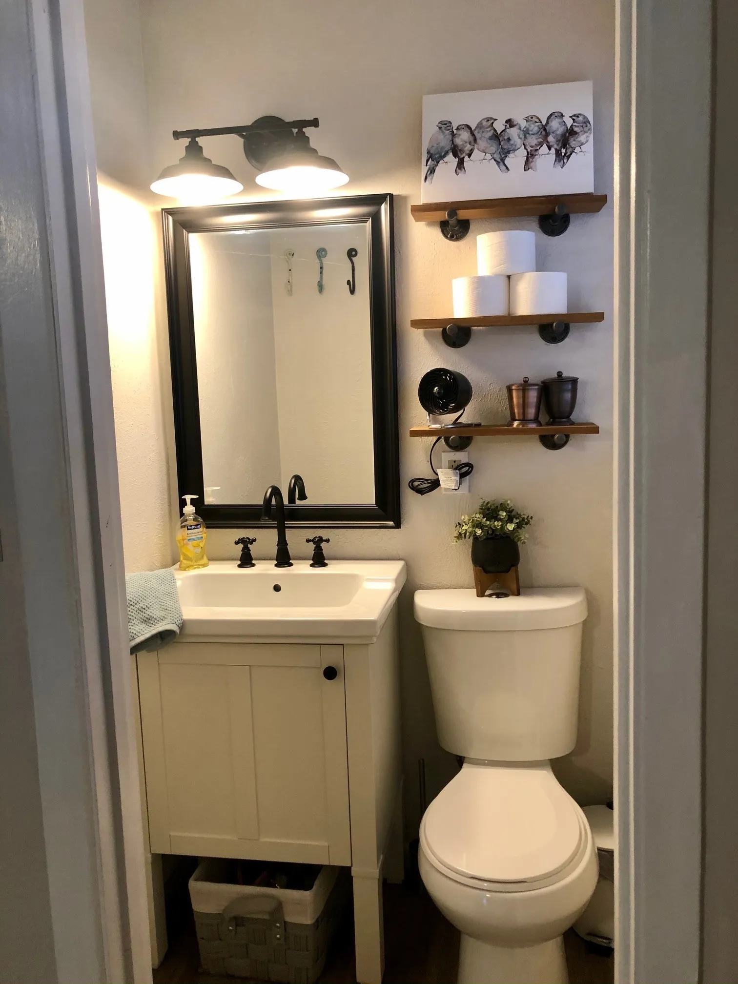 2nd bathroom featuring a white vanity with integrated sink