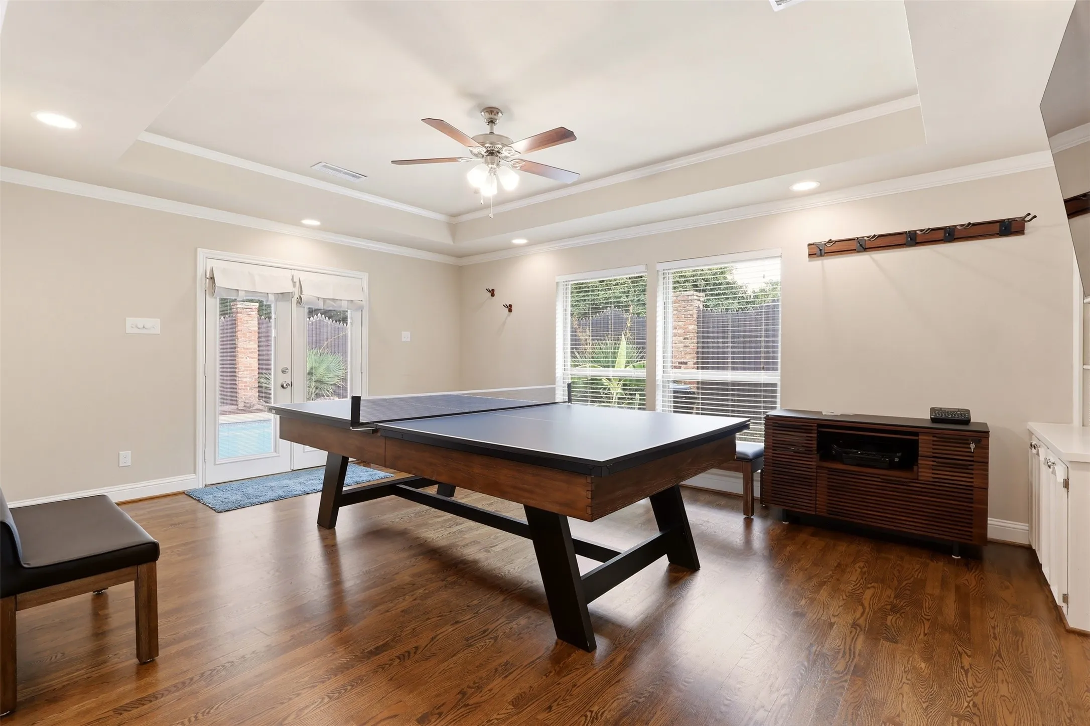 Open-concept living space featuring wood-finish flooring throughout