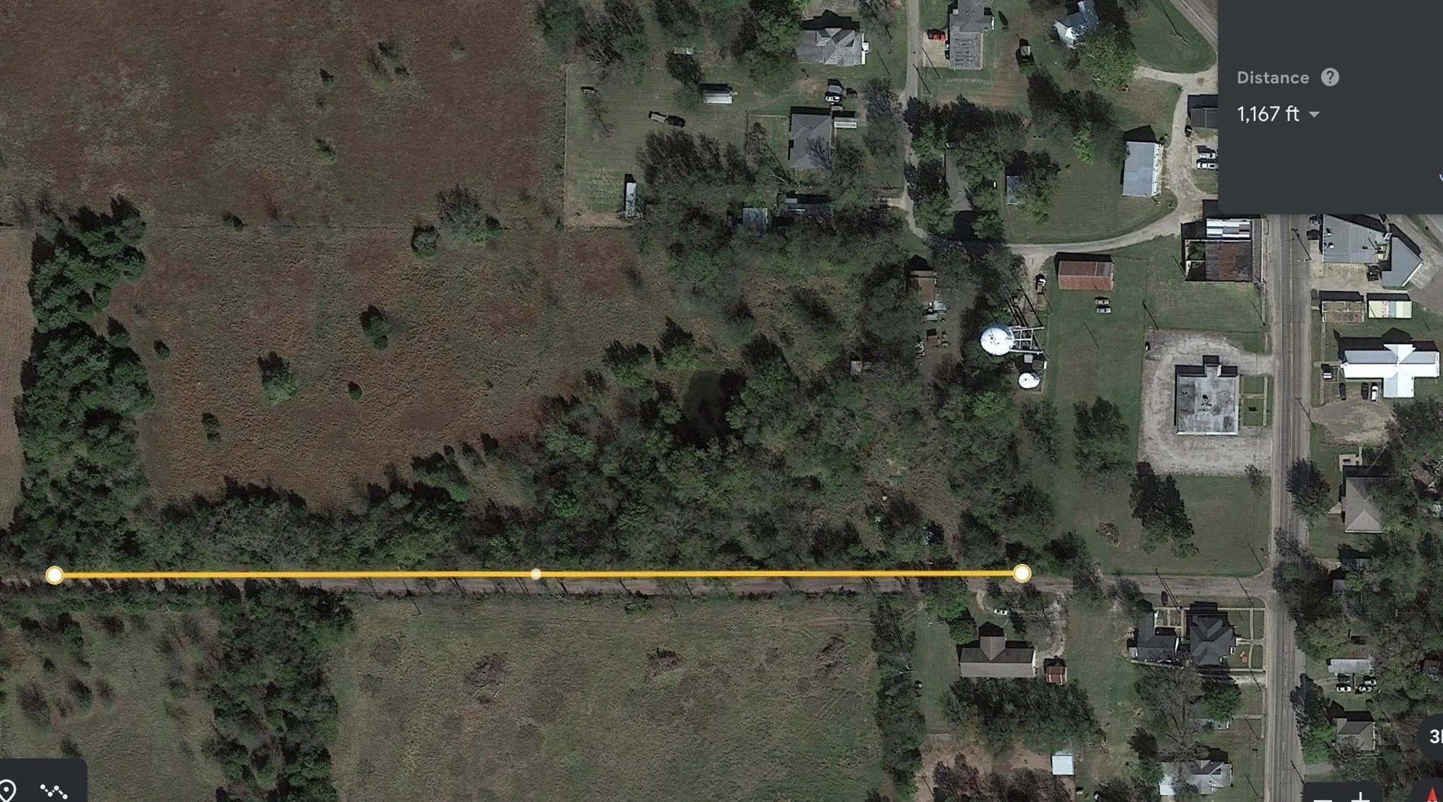 Aerial map of property and surrounding area featuring property boundaries highlighted