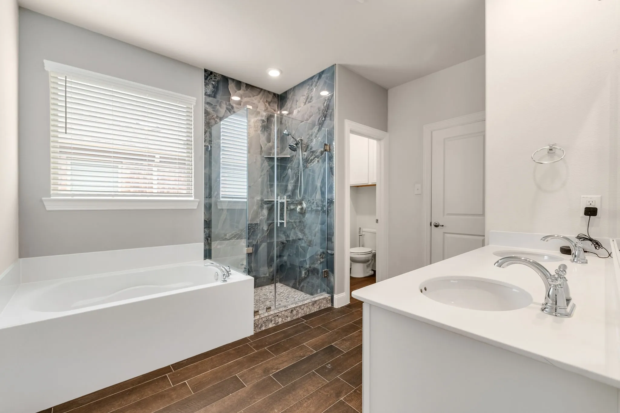 Renovated Shower, Deep Soaking Tub, Double sinks, Built-in shelves, Luxury Tile Flooring