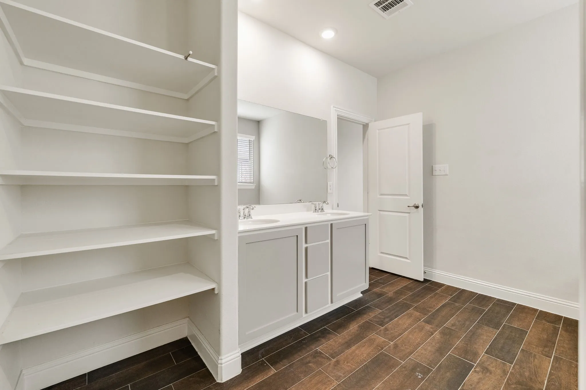 Renovated Shower, Deep Soaking Tub, Double sinks, Built-in shelves, Luxury Tile Flooring