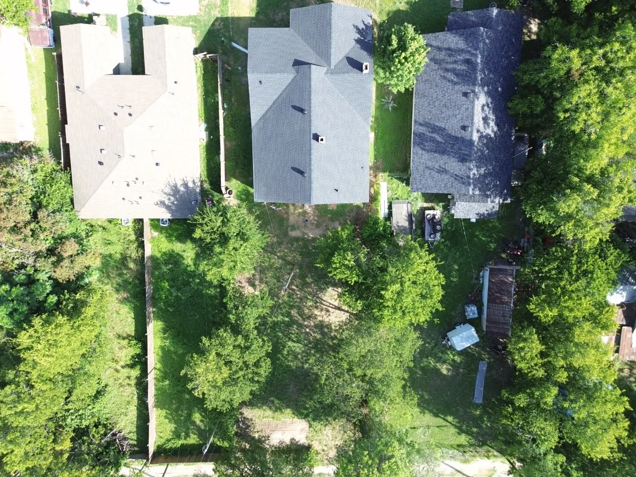Large backyard with plenty of room for outdoor living or future improvements.