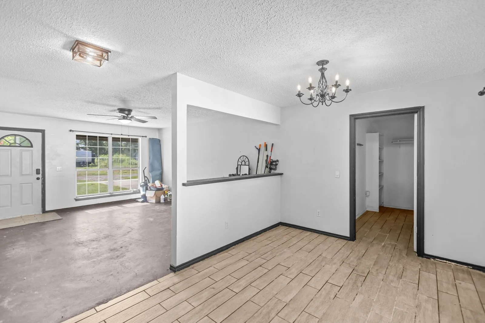Dining Room leading to utility, garage, living, and backyard