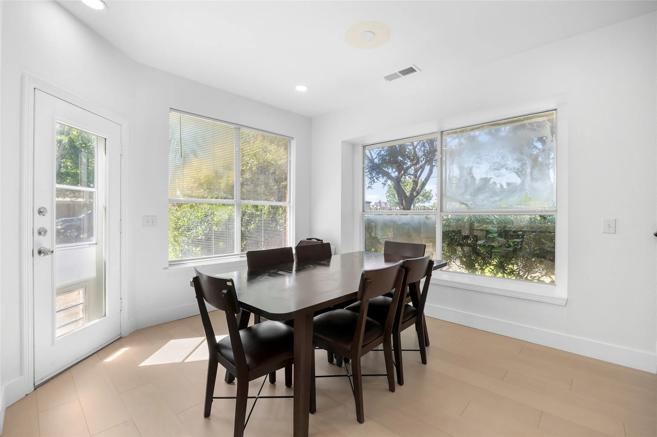 Off kitchen this breakfast room is full of natural light