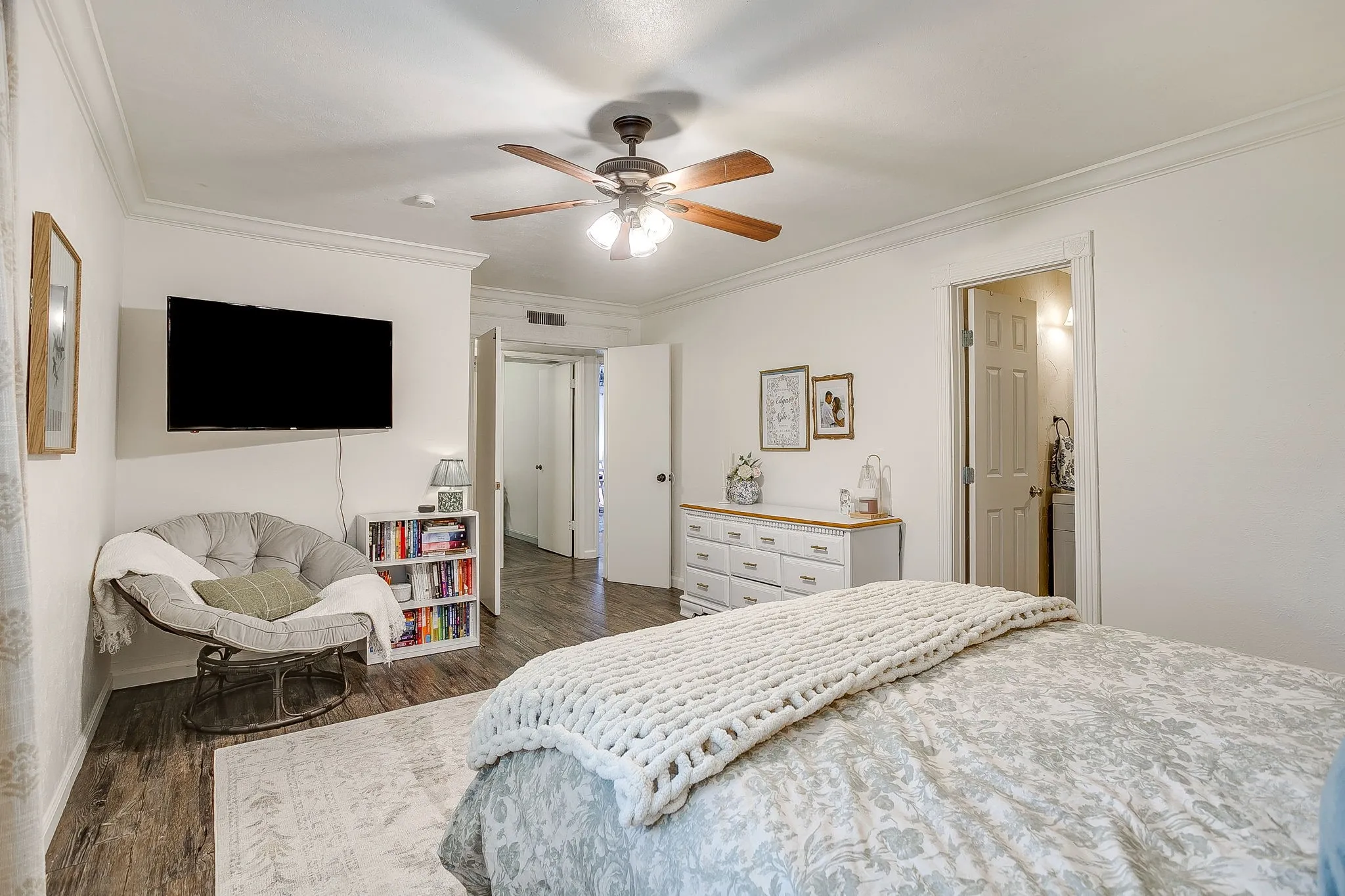 Lovely and large primary suite with ensuite bath and double doors for privacy.