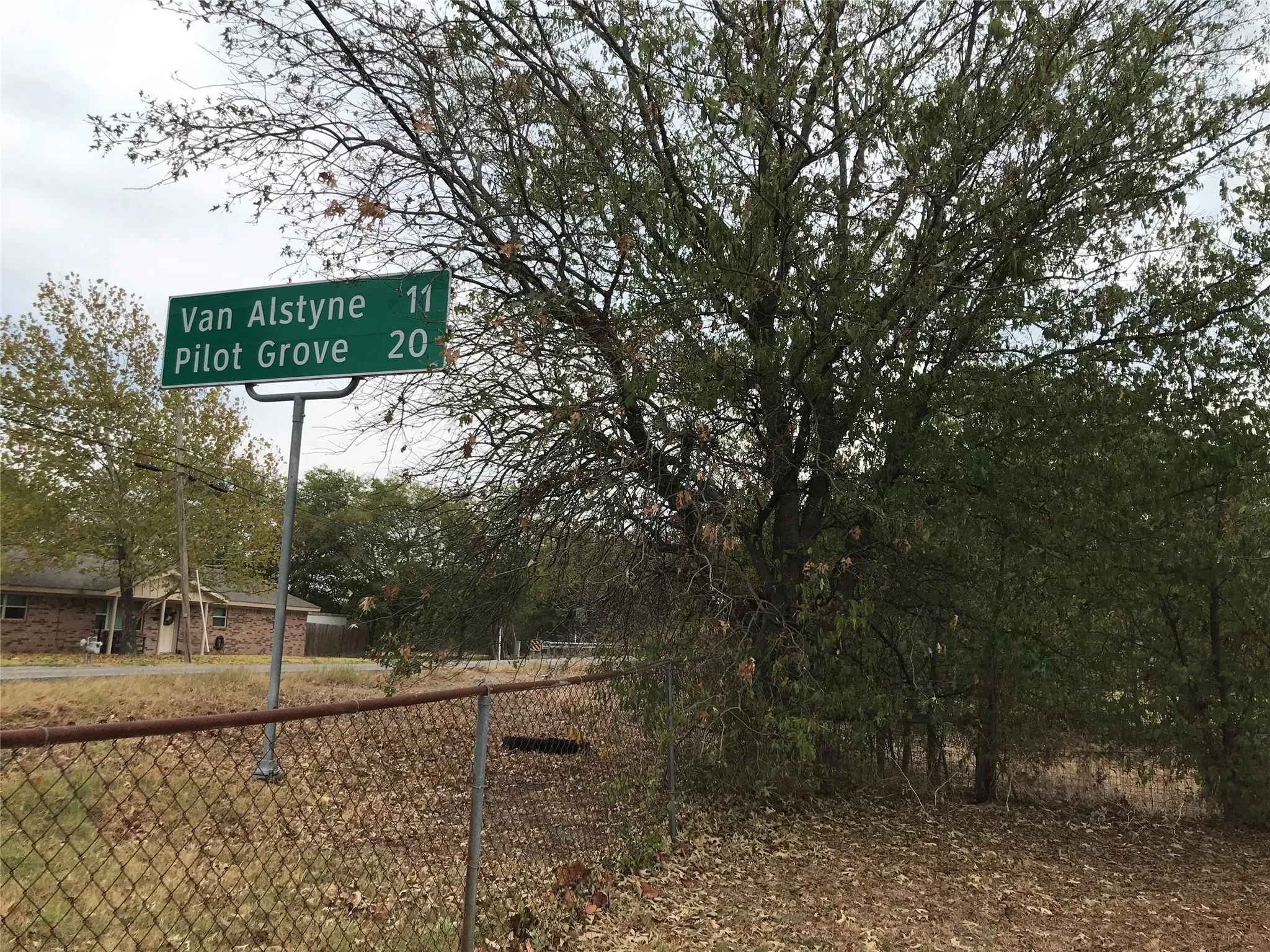 Sign at NE corner of property