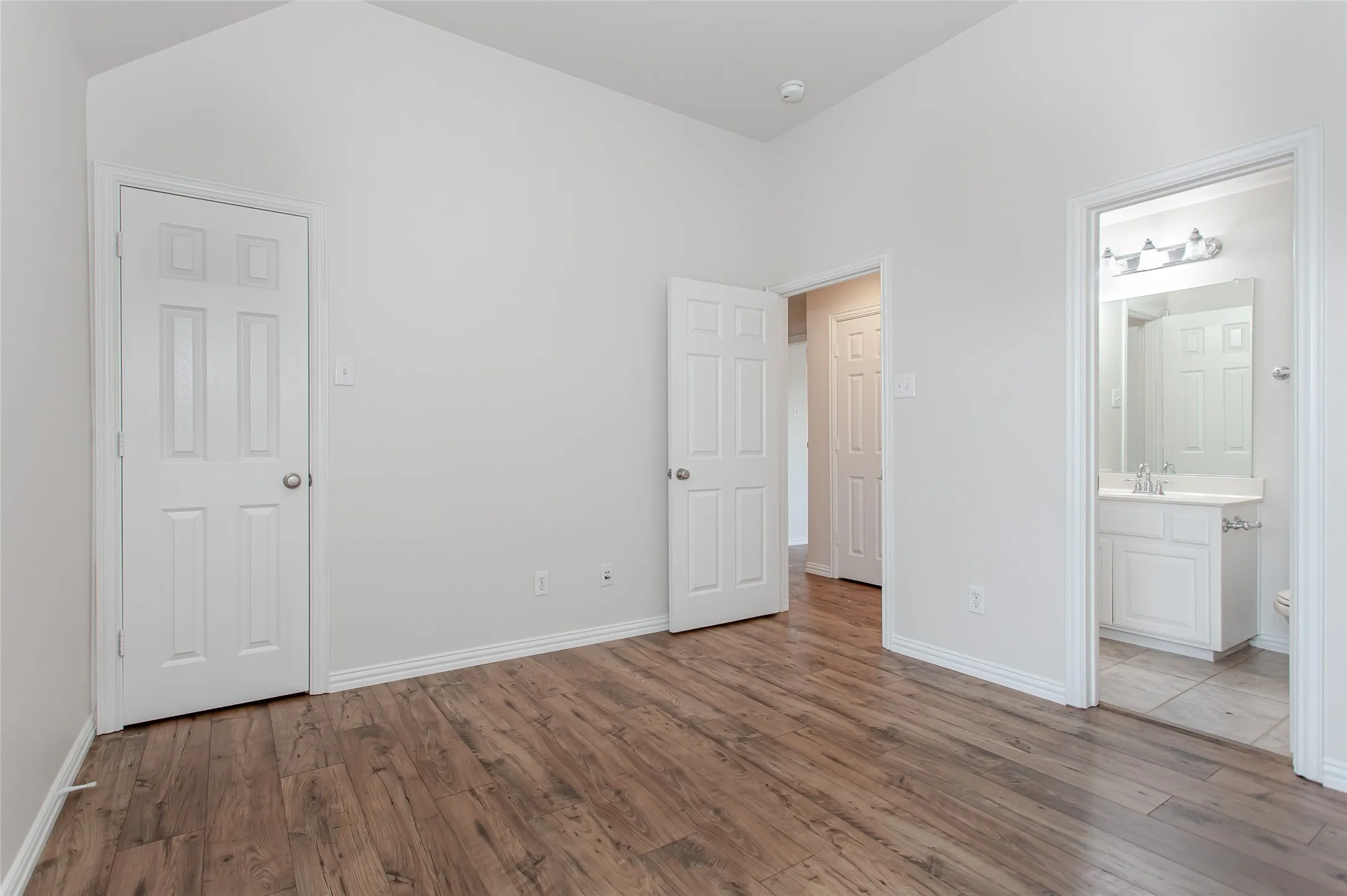 Upstairs bedroom 2 connected by a jack and Jill bath