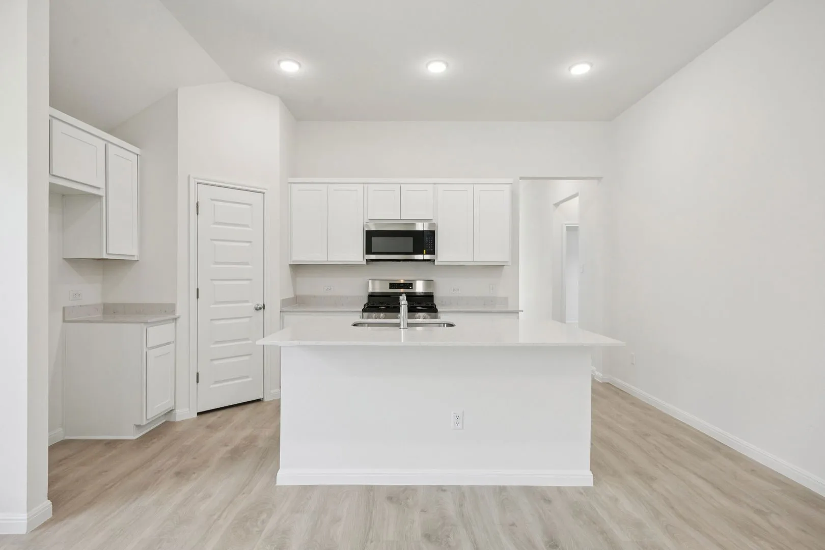 Kitchen in the Cypress home plan by Trophy Signature Homes - REPRESENTATIVE PHOTO