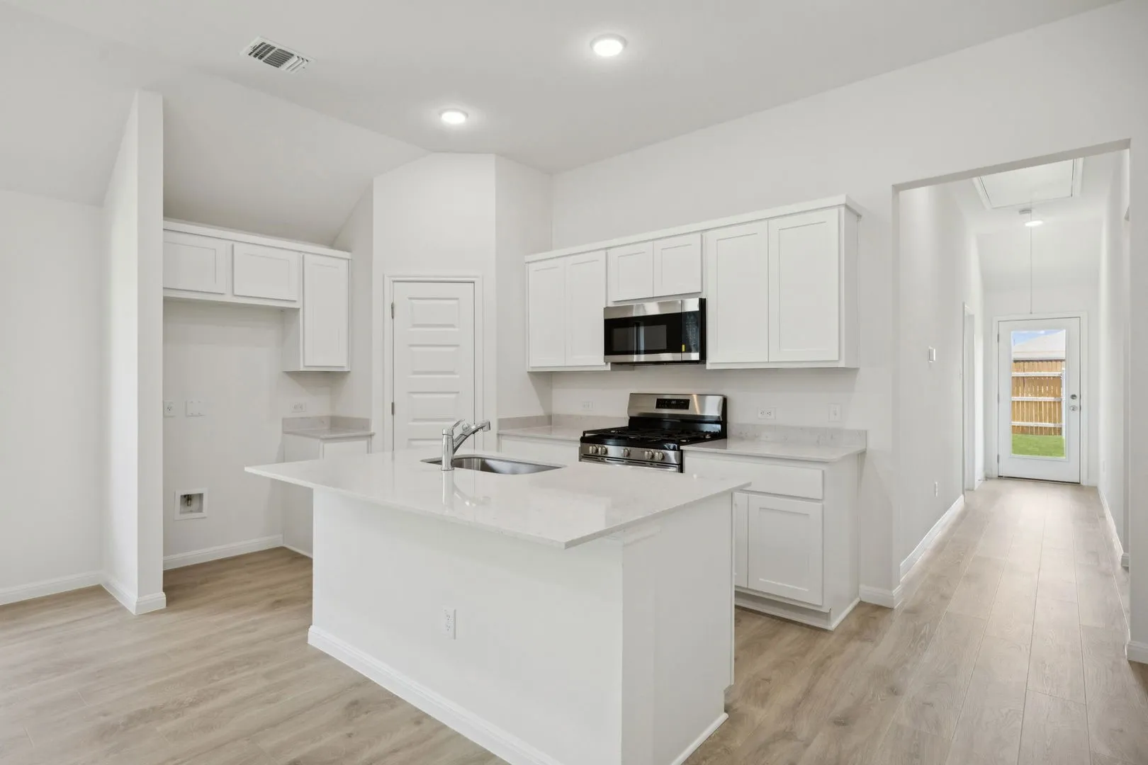Kitchen in the Cypress home plan by Trophy Signature Homes - REPRESENTATIVE PHOTO