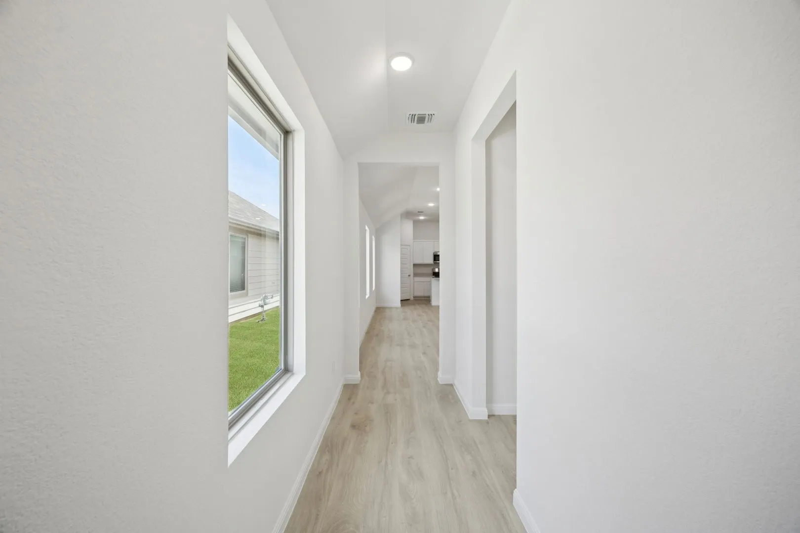 Entryway in the Cypress home plan by Trophy Signature Homes - REPRESENTATIVE PHOTO