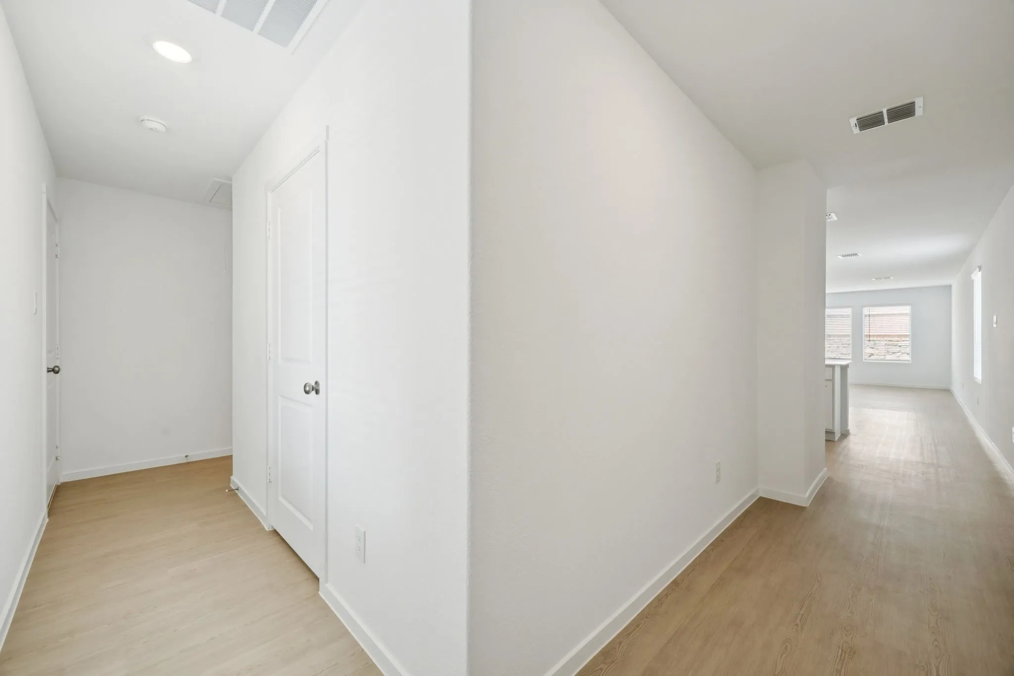 hallway (primary bedroom is away from secondary bedrooms)