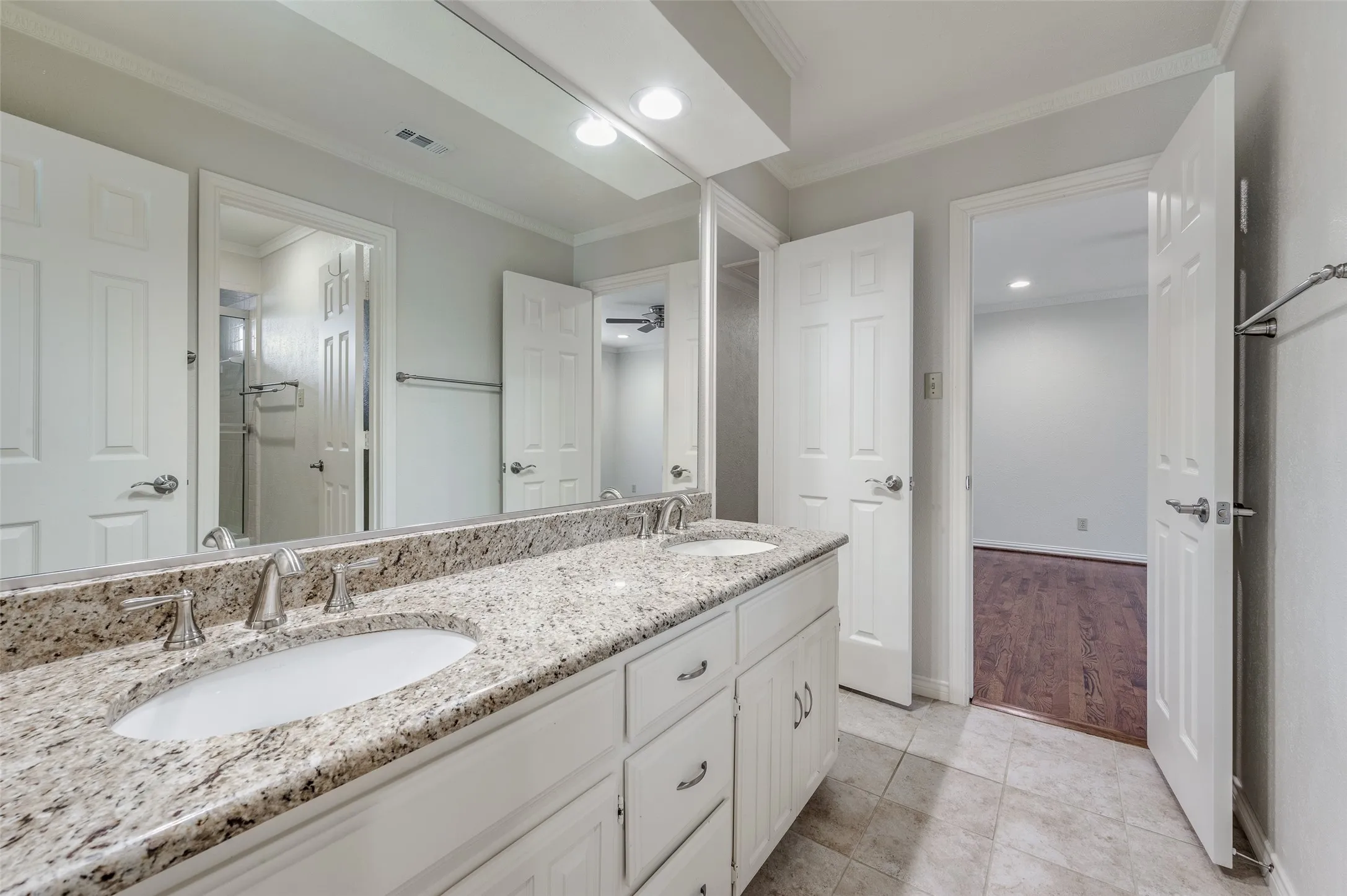 Jack-and-jill bath area connecting the two secondary bedrooms