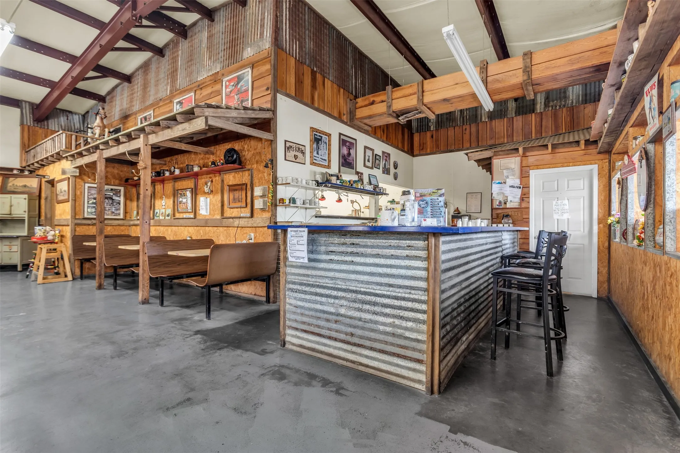 Bar seating with booths and tables and chairs