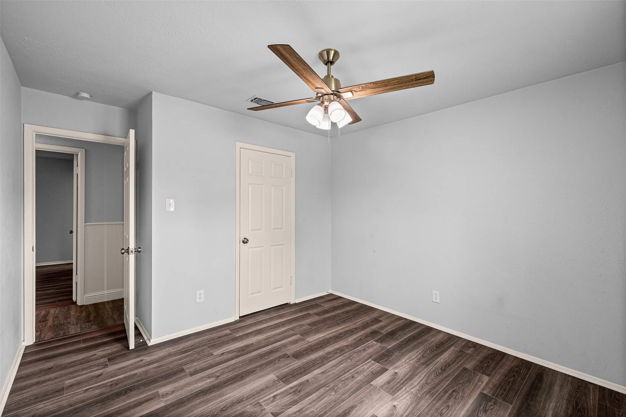 Secondary bedroom with spacious closet.