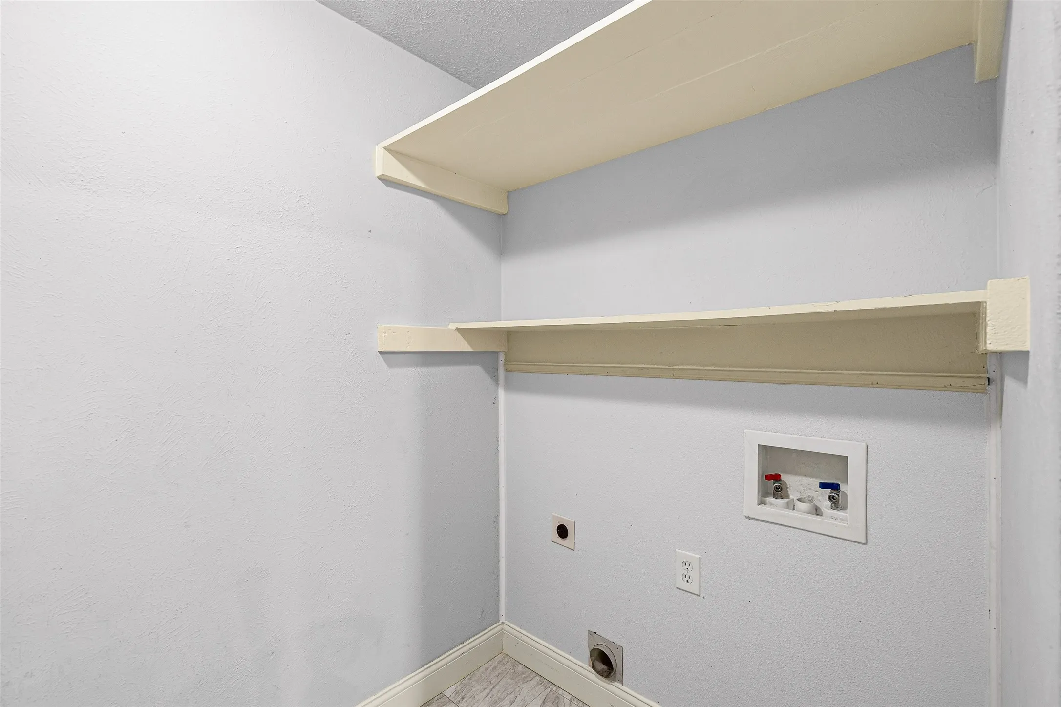 Laundry and pantry share a space.