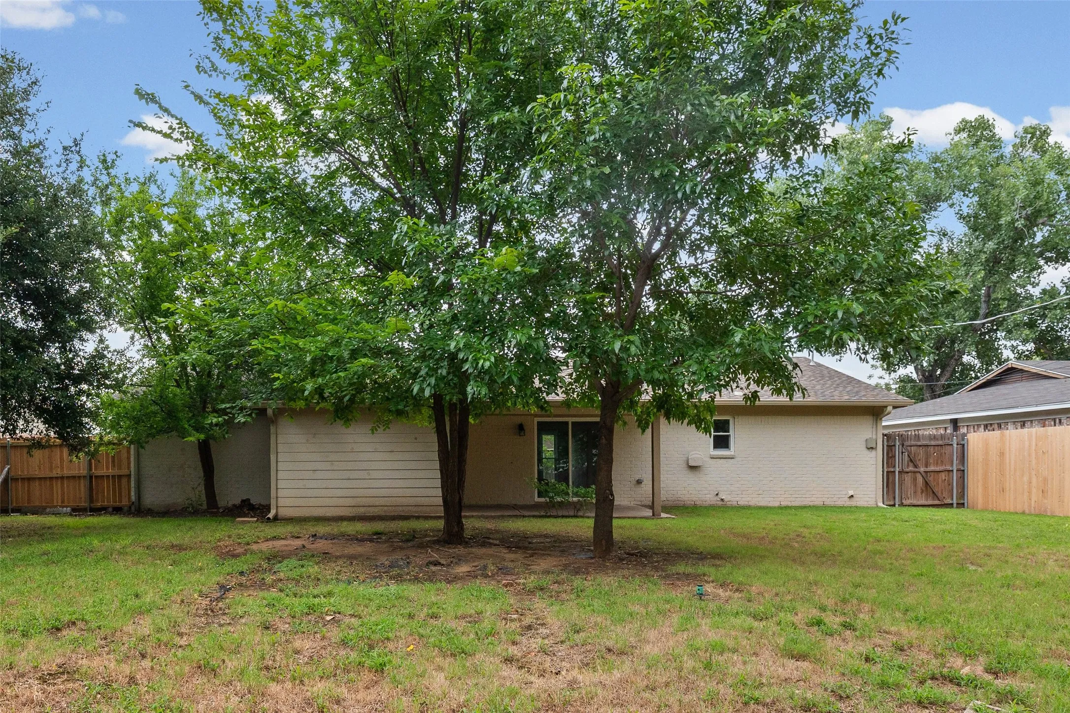 Mature trees help provide shade for those sunny summer days.