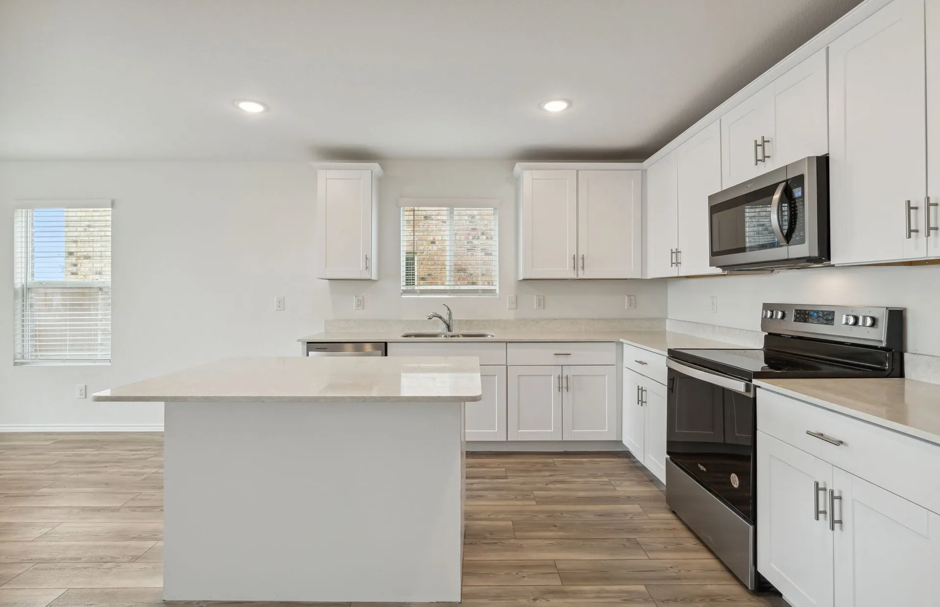 *Floorplan representation, not actual home - Large island overlooking gathering room and dining areas