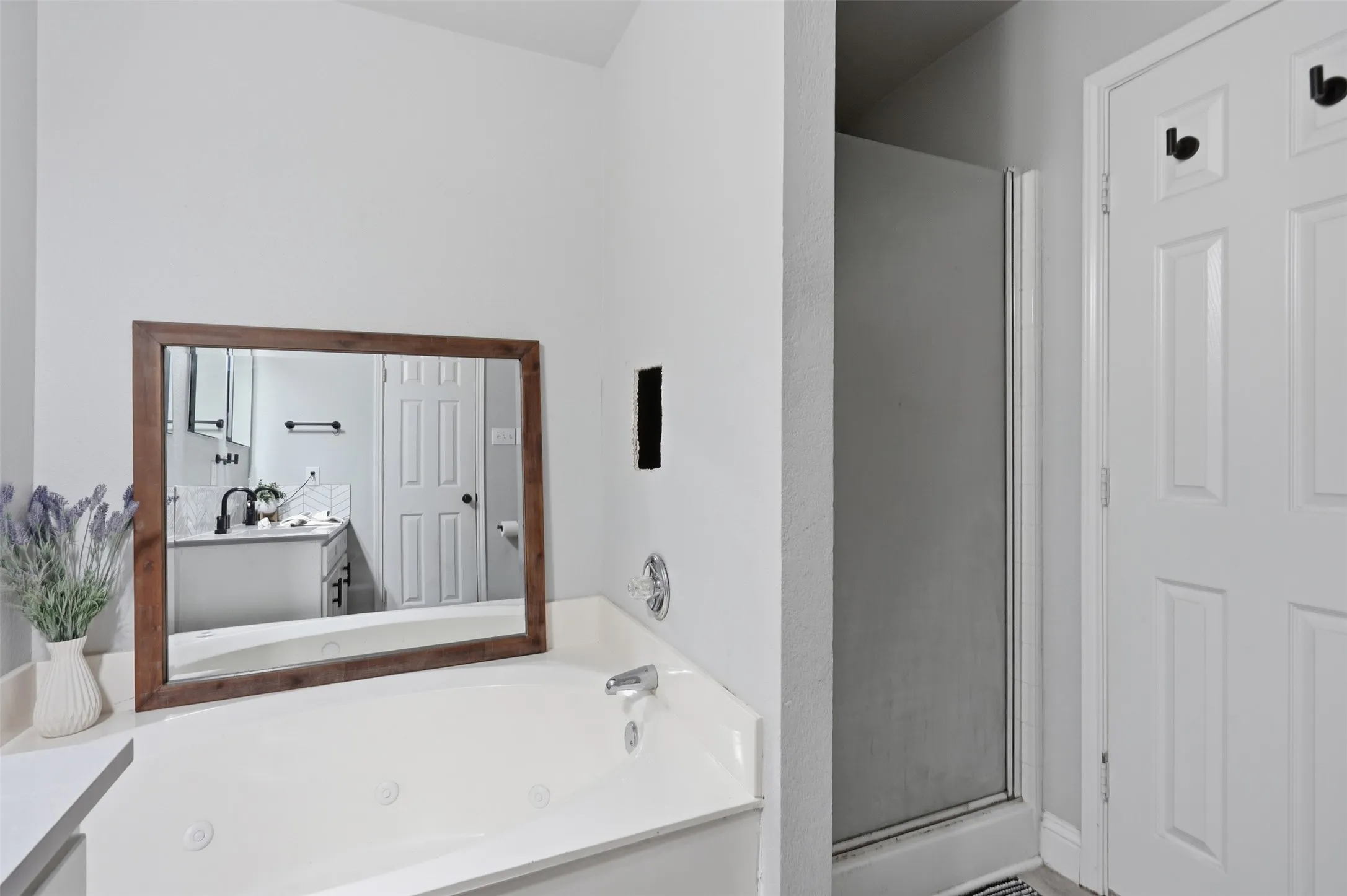 Soaking tub with integrated jets and chrome fixtures