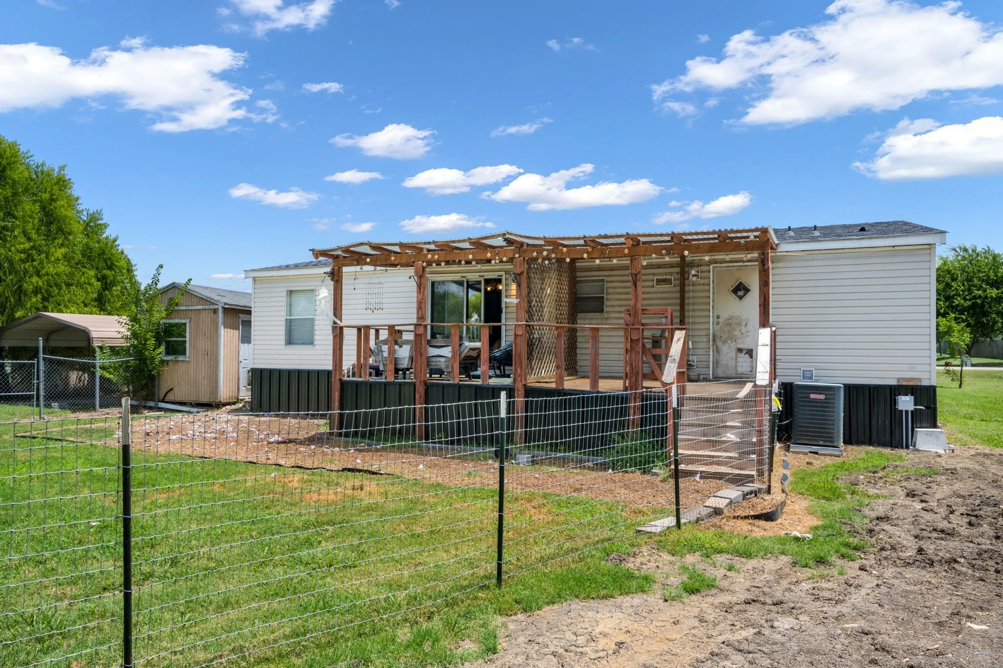 Manufactured Home For Sale in Wise County , 1215 Alliance Boulevard, Rhome, Texas 76078, 3 Bedrooms, 2 Bathrooms, 1 Garage spaces, 1,450 Sqft, built in 2009, Price $250,000, mls#21337871, Real Estate Agent in Rhome, Homes For Sale in Wise county, Homes For Sale in Rhome, Realtor in Rhome Texas, Real Estate Brokerage Independent Realty Texas, Luminita Cordes Realtor