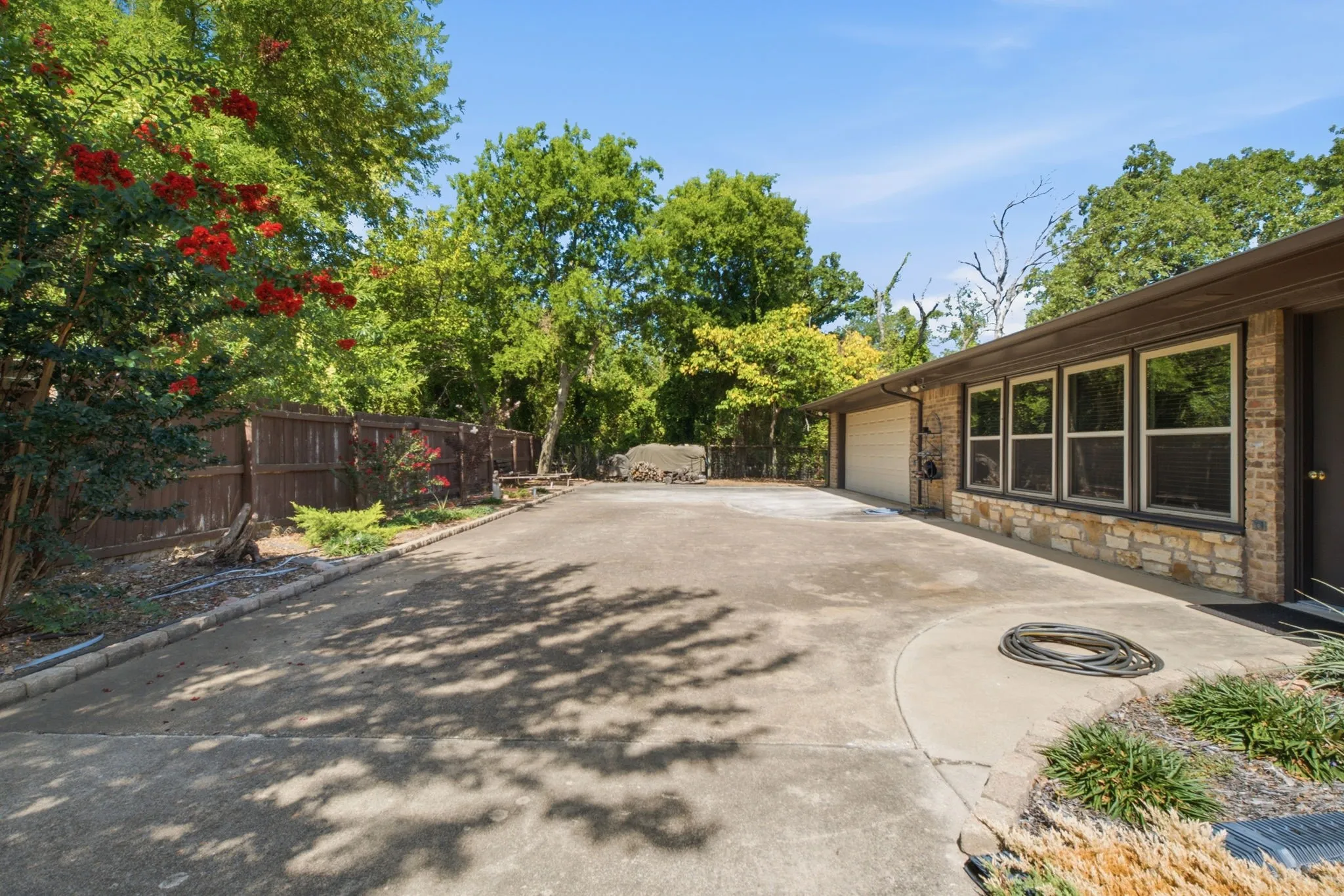 Driveway and a 2 Car Garage. Lots of room for parking.