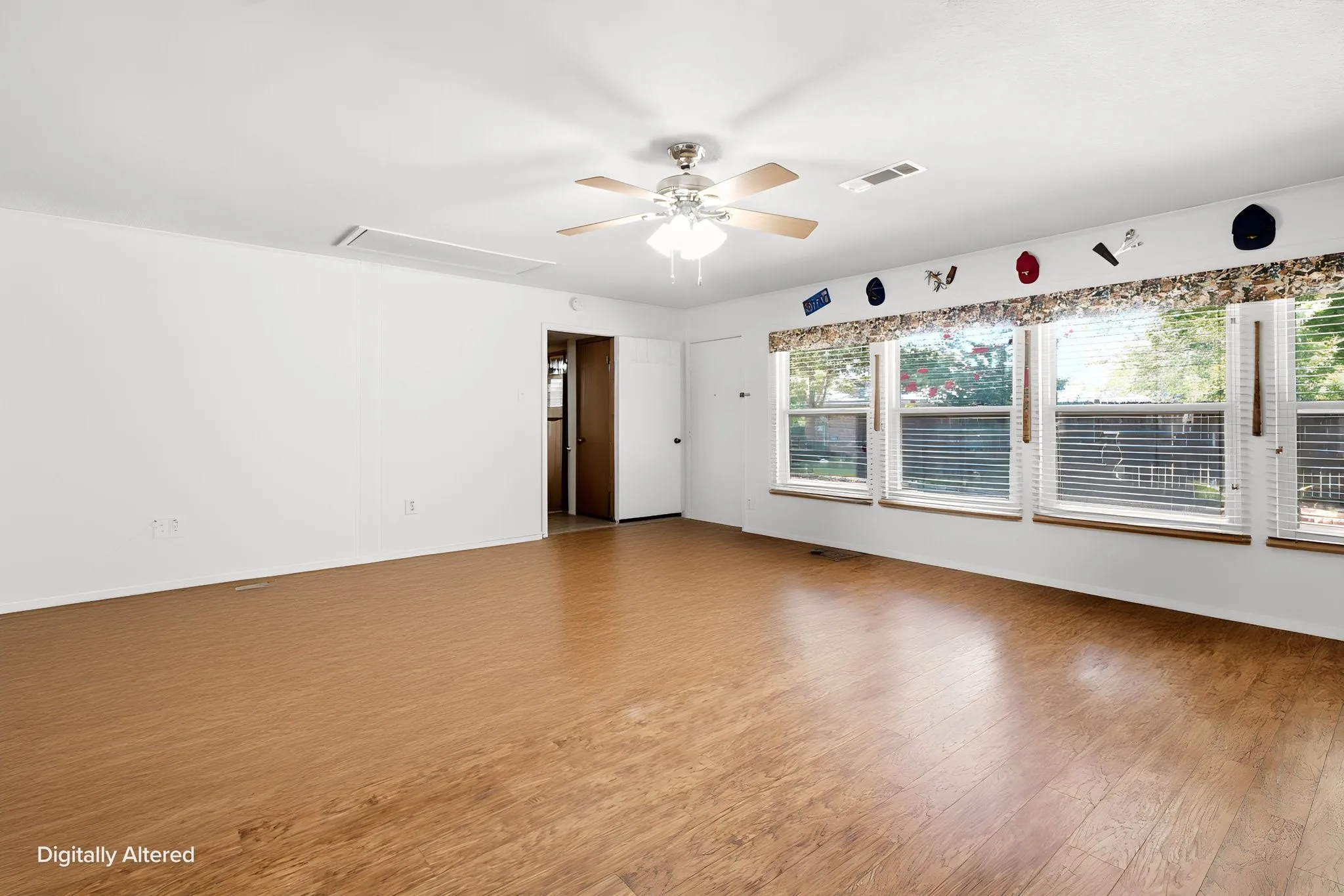 2nd Living Area with no furniture. Digitally Altered