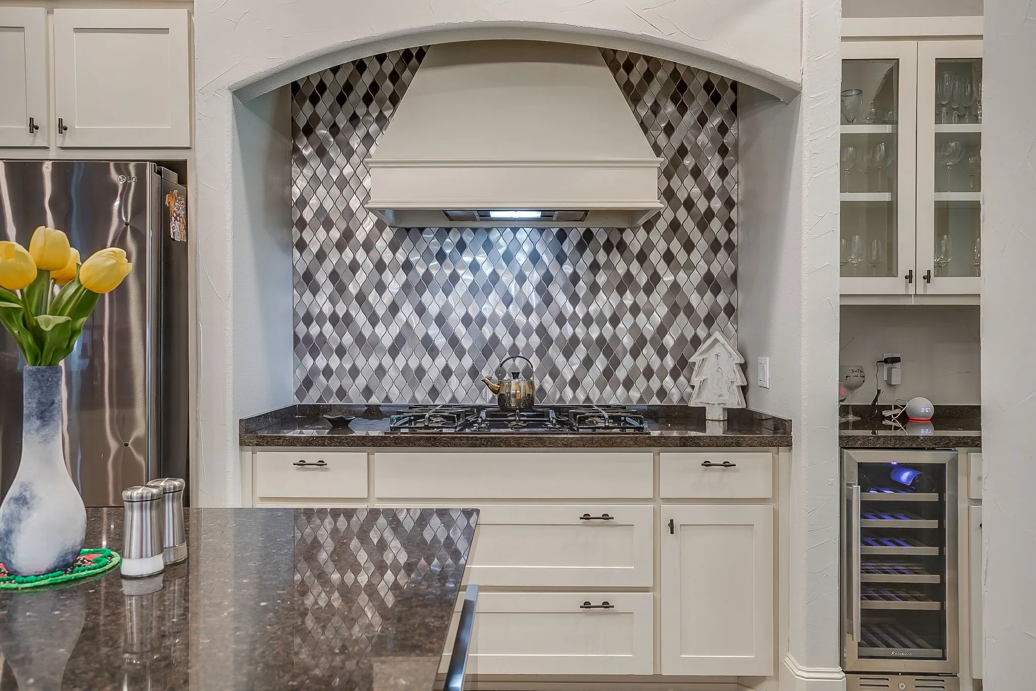 gas range, wine fridge in pass through space to formal dining. Perfect for entertaining