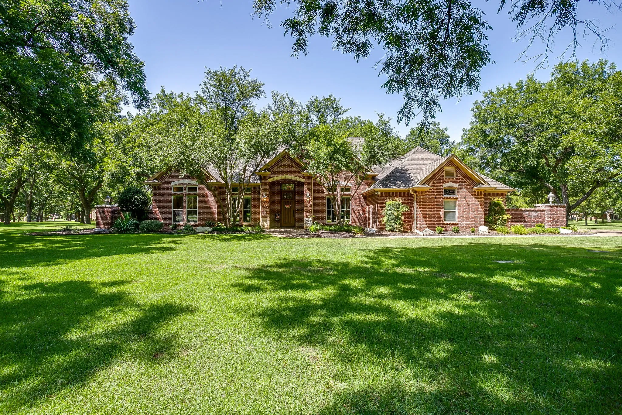 Gorgeous masonry exterior. Heavily wooded lot
