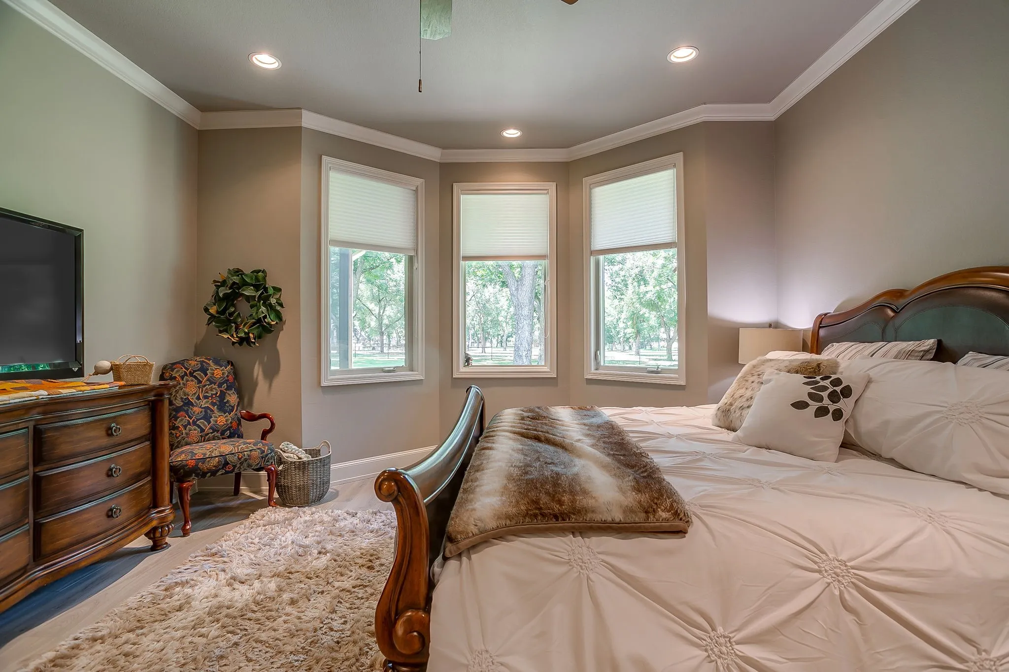 Primary bedroom with large windows that would make a great additional seating area