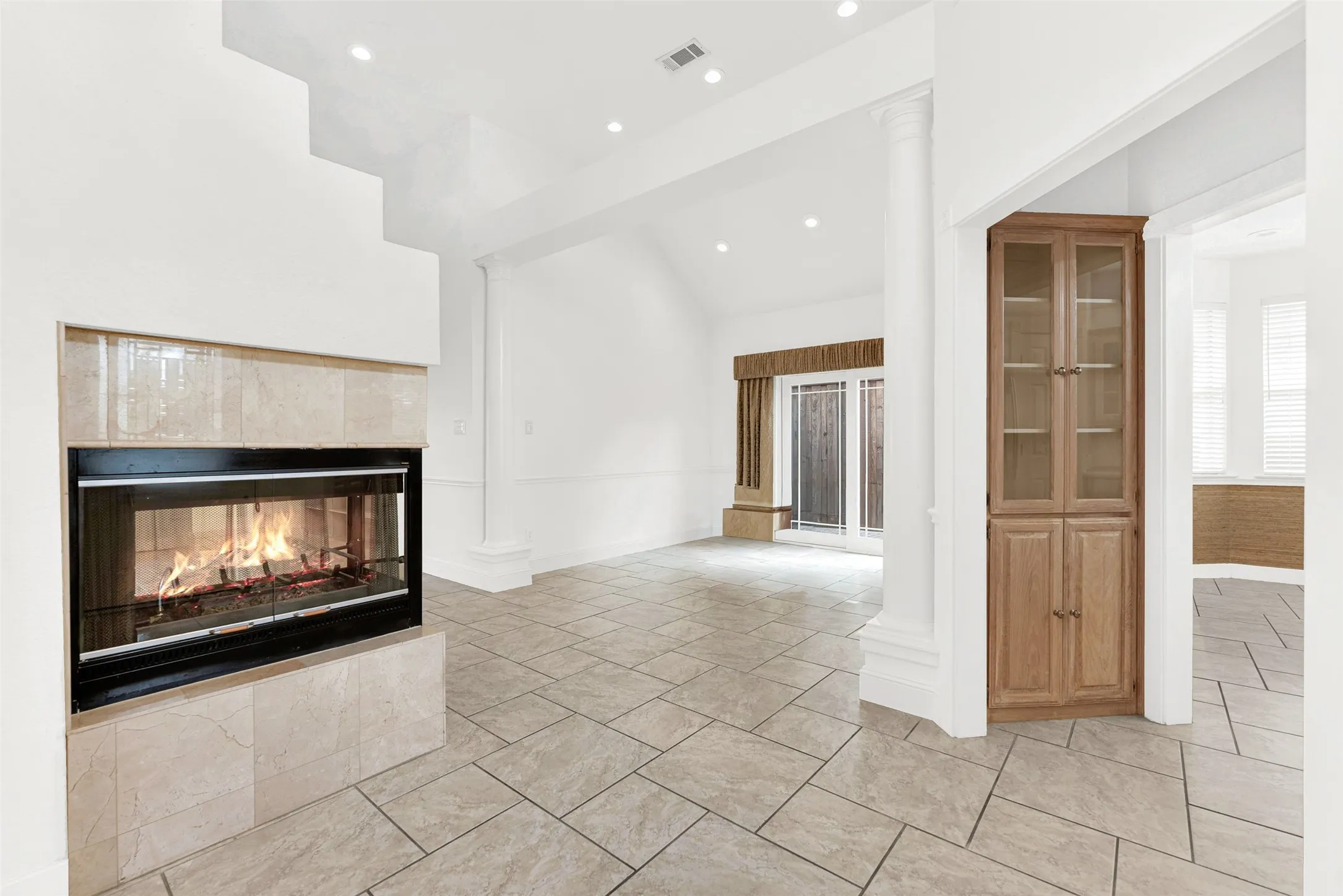 Act as a luxury real estate marketing expert and lifestyle storyteller. Analyze these images of a kitchen  and provide exactly two descriptive sentences about each photo, no more than 50 words total. Provide different details about each photo, even though they are the same room, just different angles. Do not repeat details. Disregard any furniture or added accessories in the room. Keep track of the previous descriptions of rooms in this chat and do not repeat phrases.Sentence 1: Focus on the architectural soul. Describe the most striking physical feature and how it interacts with light or space.
Sentence 2: Focus on the emotional experience. Help a buyer visualize a specific moment of daily life in this room (e.g., a quiet morning coffee, hosting an elegant dinner, or a relaxing evening retreat).
Tone: casual, friendly, inviting, and evocative. Avoid real estate clichés like "stunning" or "must-see."