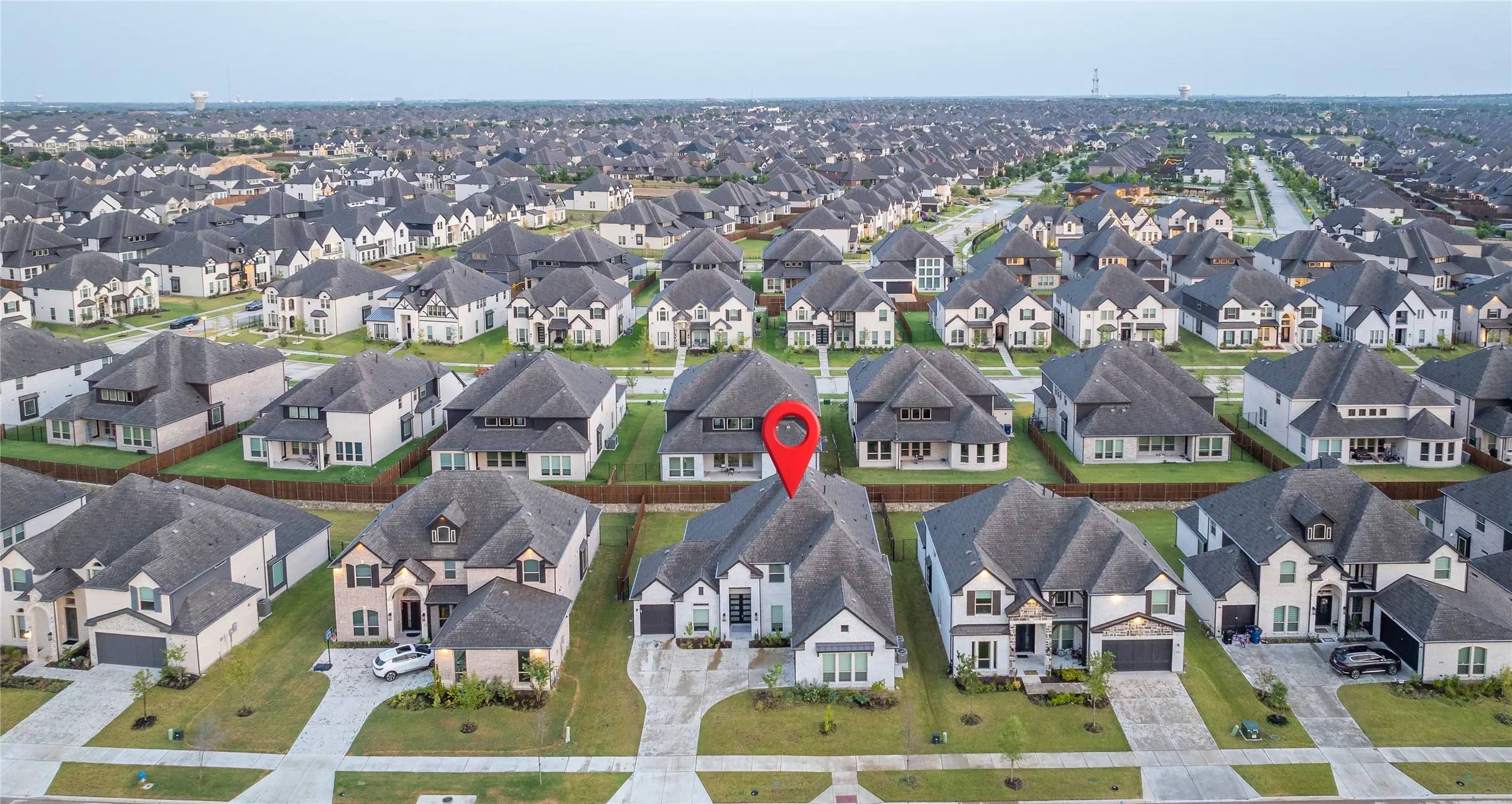 Aerial perspective showcasing a residential neighborhood with consistent architectural styling