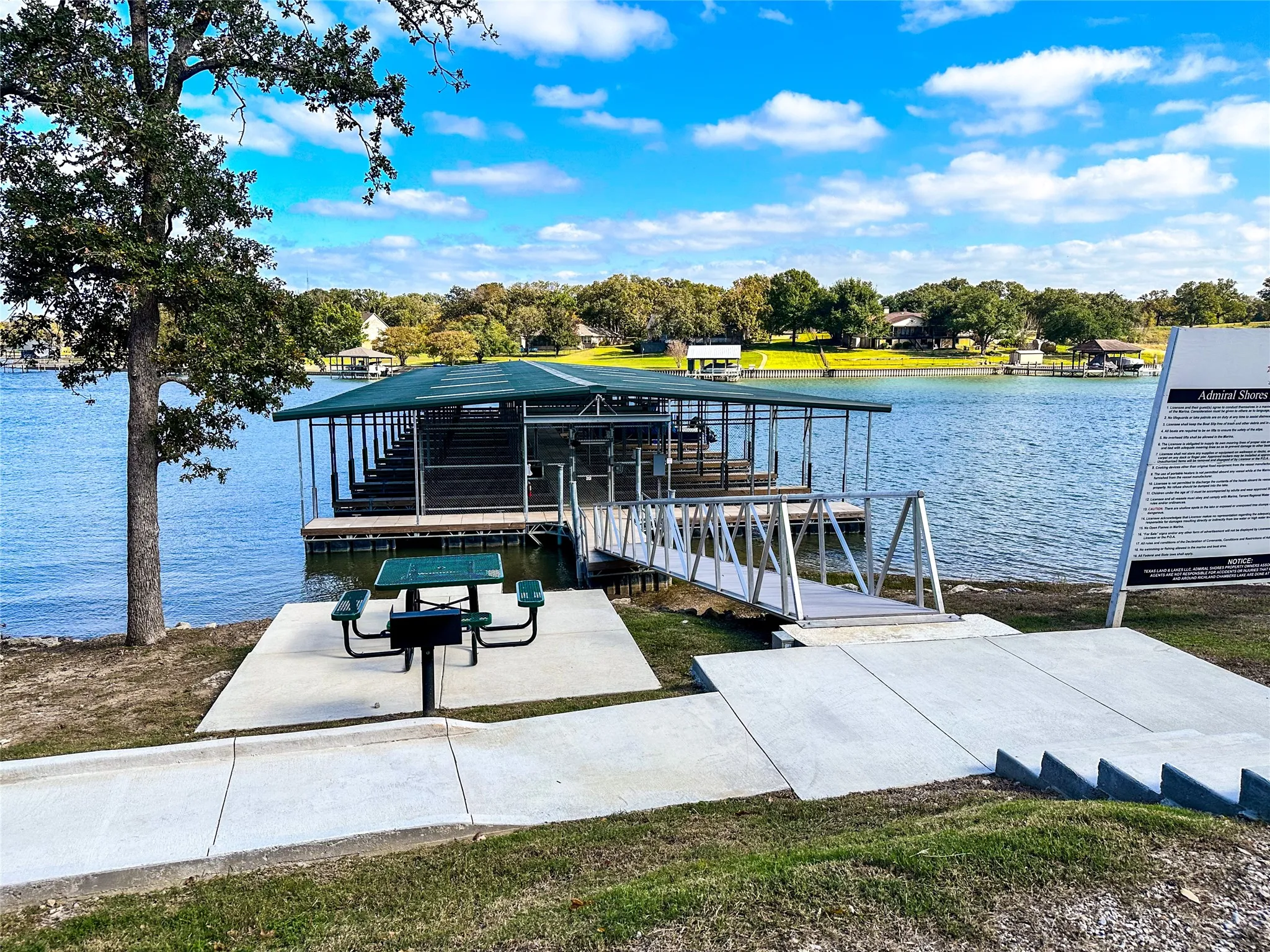 Direct water access with covered boat docks and slips for lake recreation lovers.