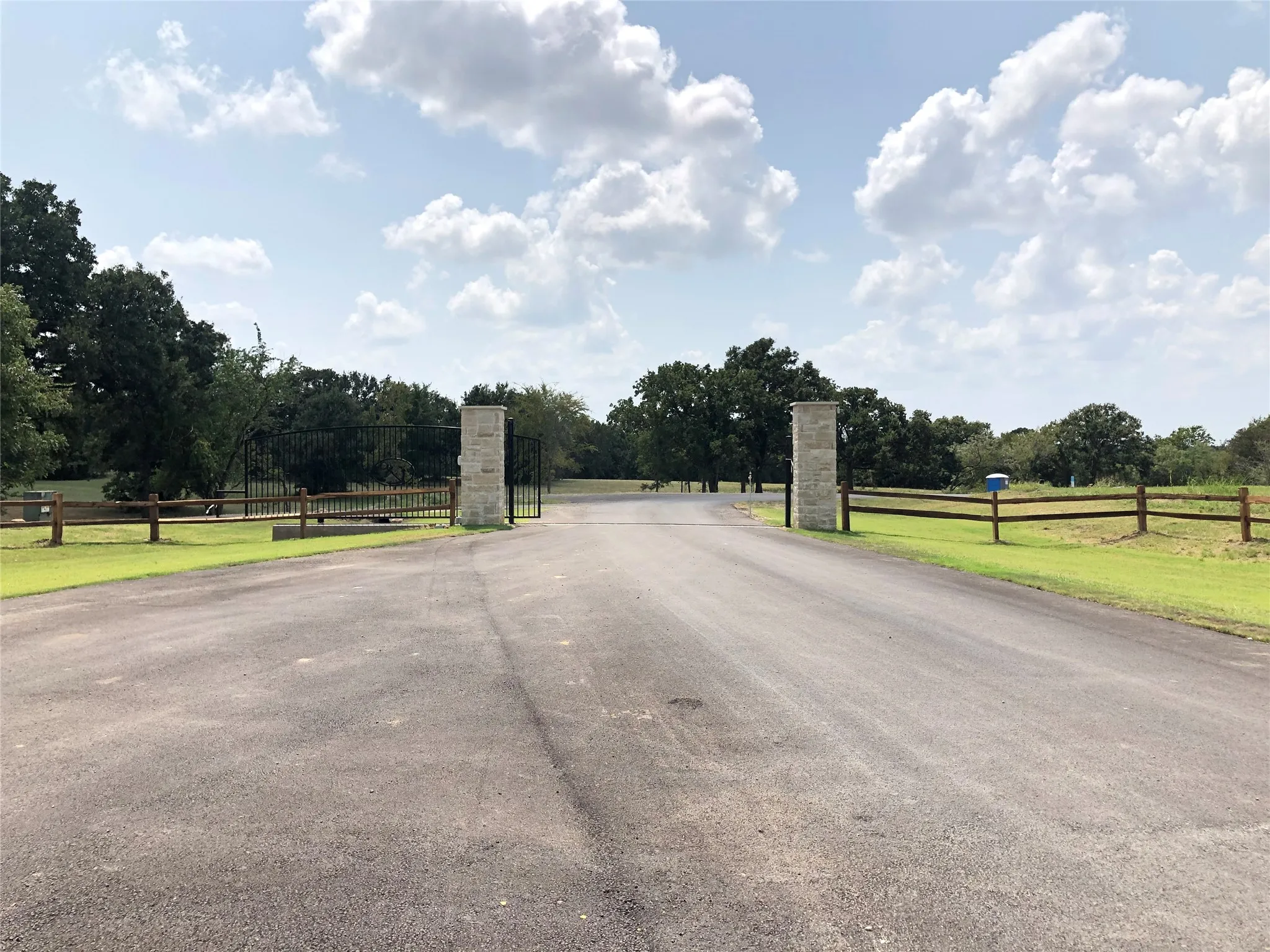 Private gated security entry ensuring quiet roads and neighborhood exclusivity.