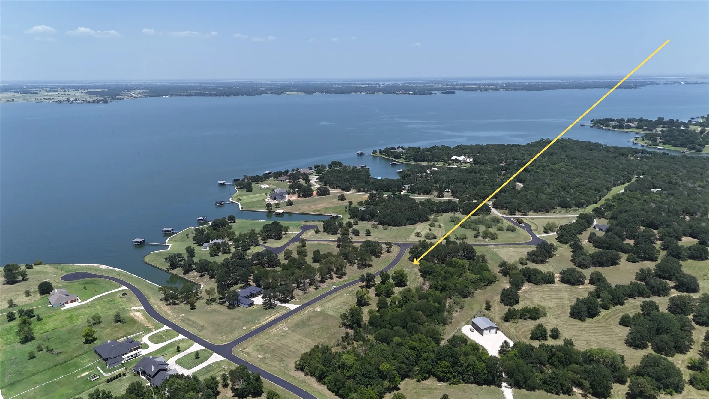 Sweeping aerial view showing the waterfront geography surrounding Admiral Shores.