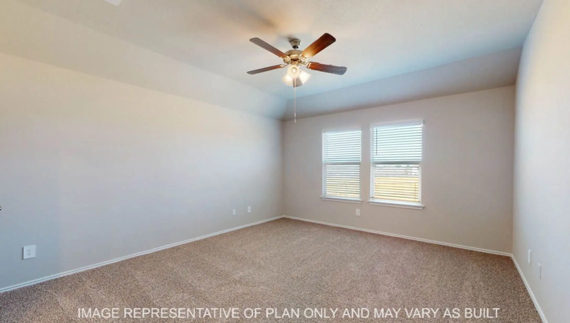 Spacious interior room featuring neutral-toned walls, plush carpeting, a ceiling fan with integrated lighting, and two windows with blinds