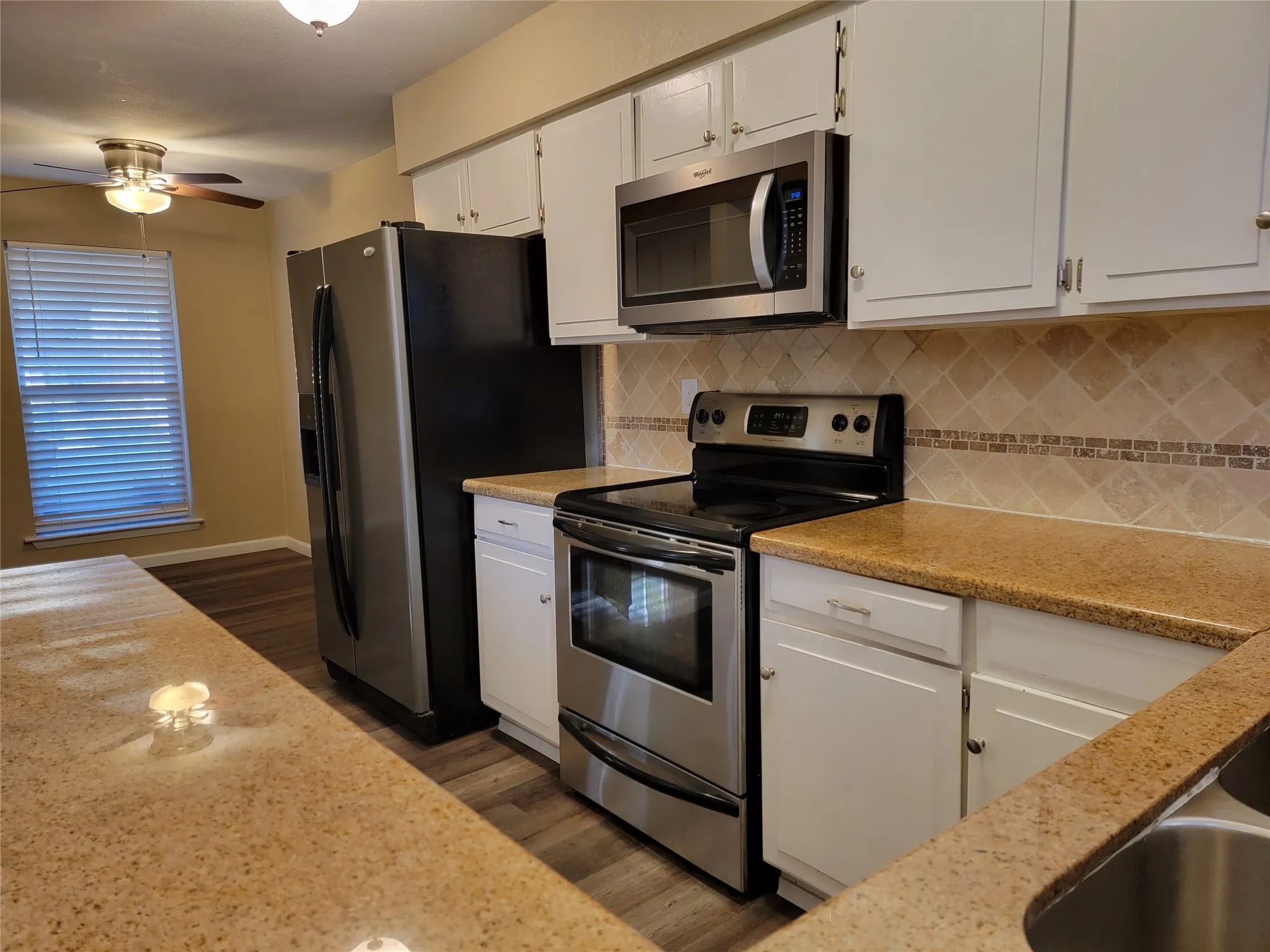 Kitchen with Granite Counters and Stainless Appliances