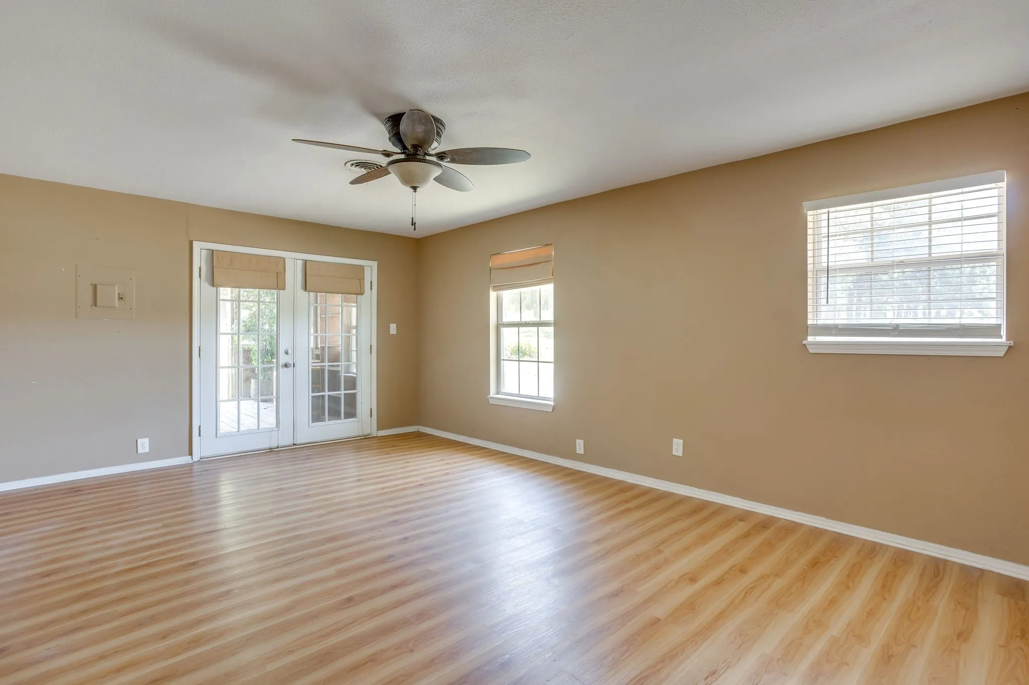 Primary Bedroom-Frenchy doors to back patio