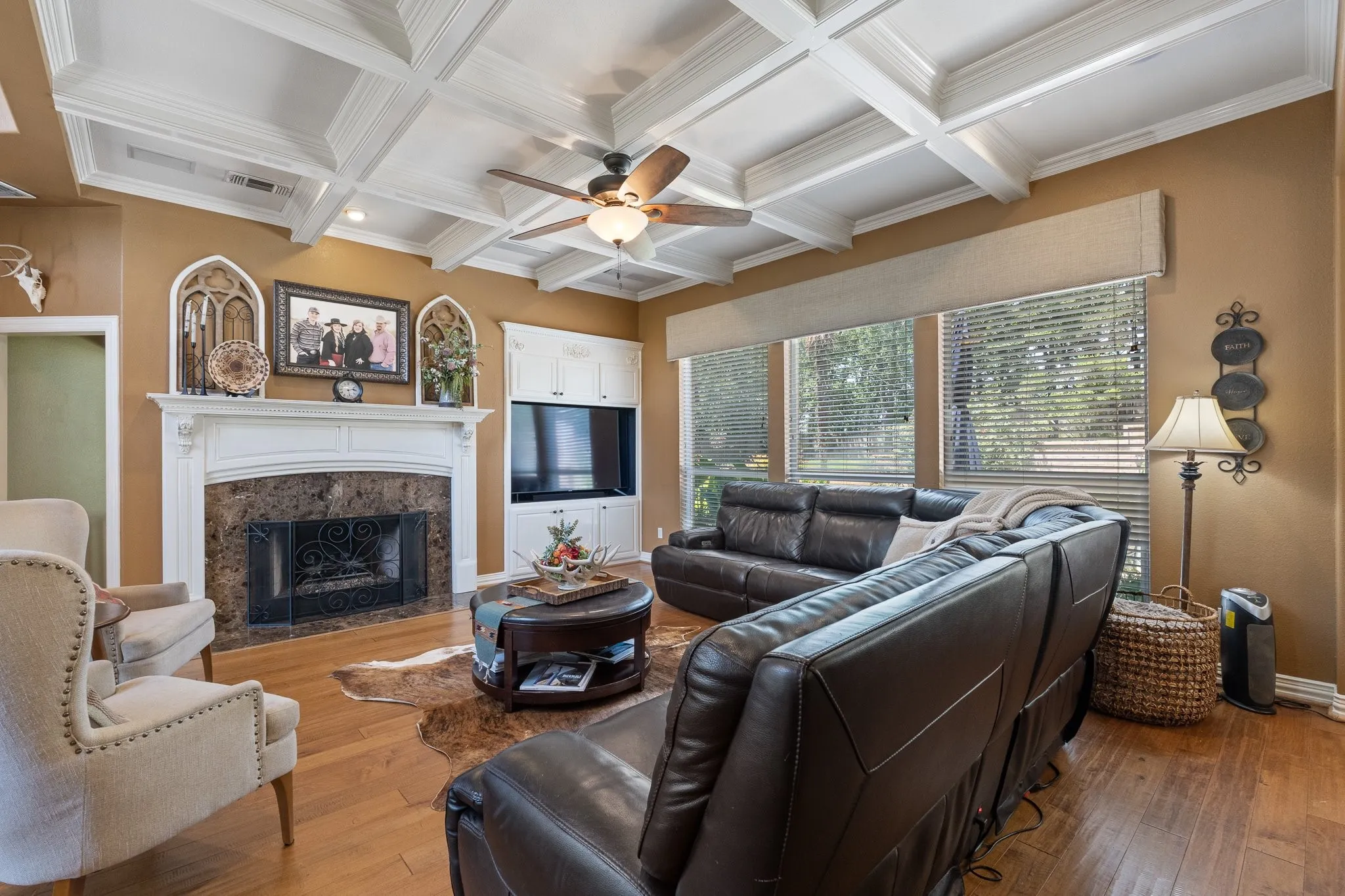 Living area featuring wood built ins
