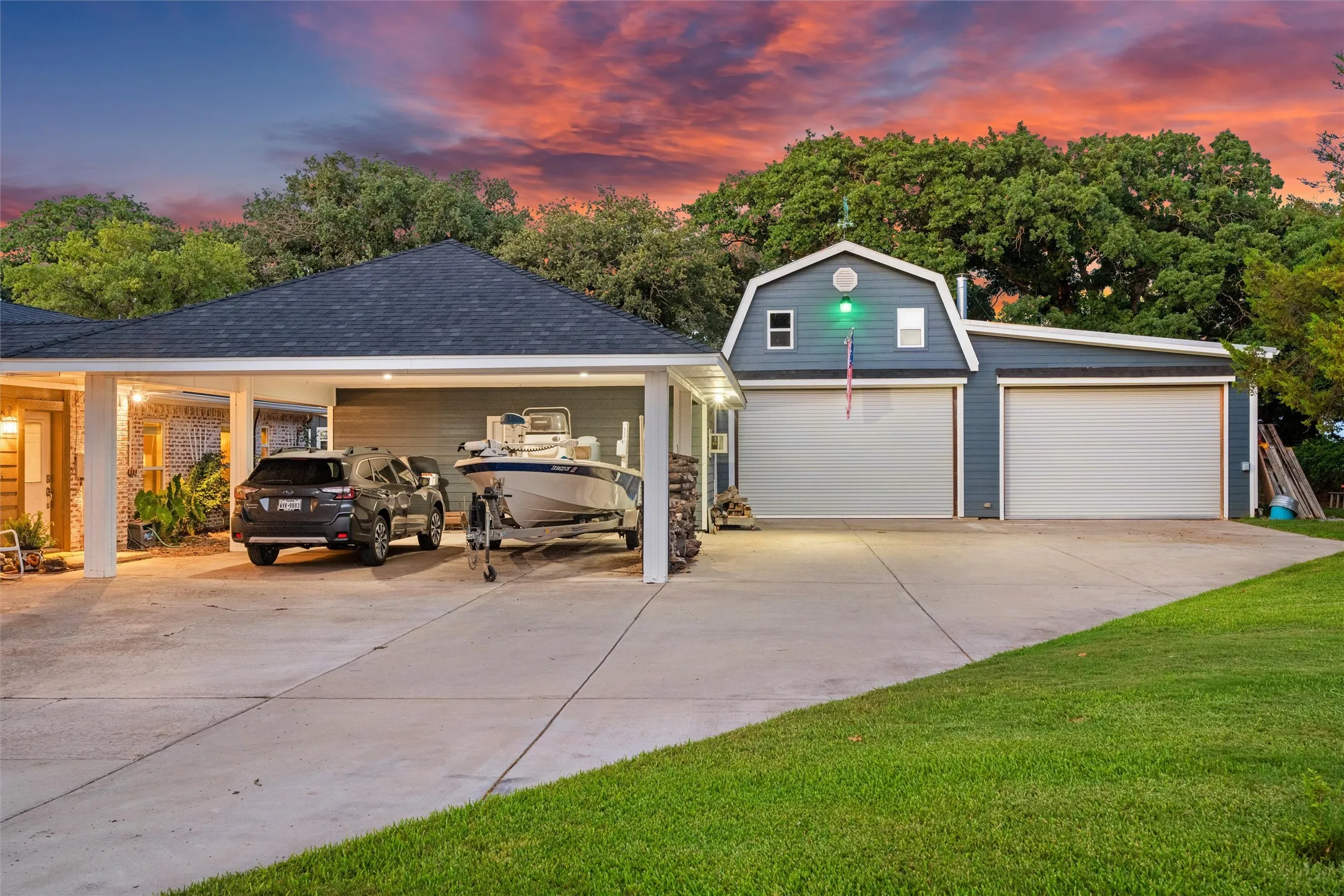 Covered parking, workshop / garage spaces, and room for RV storage.