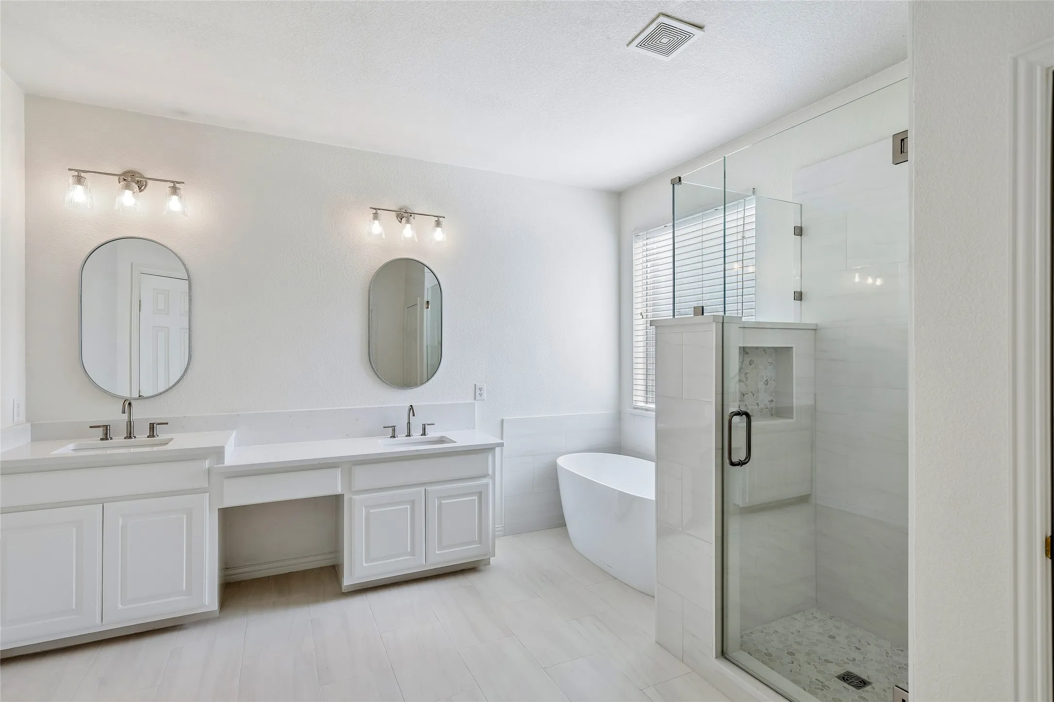 Updated vanities finish off the spectacular primary bath