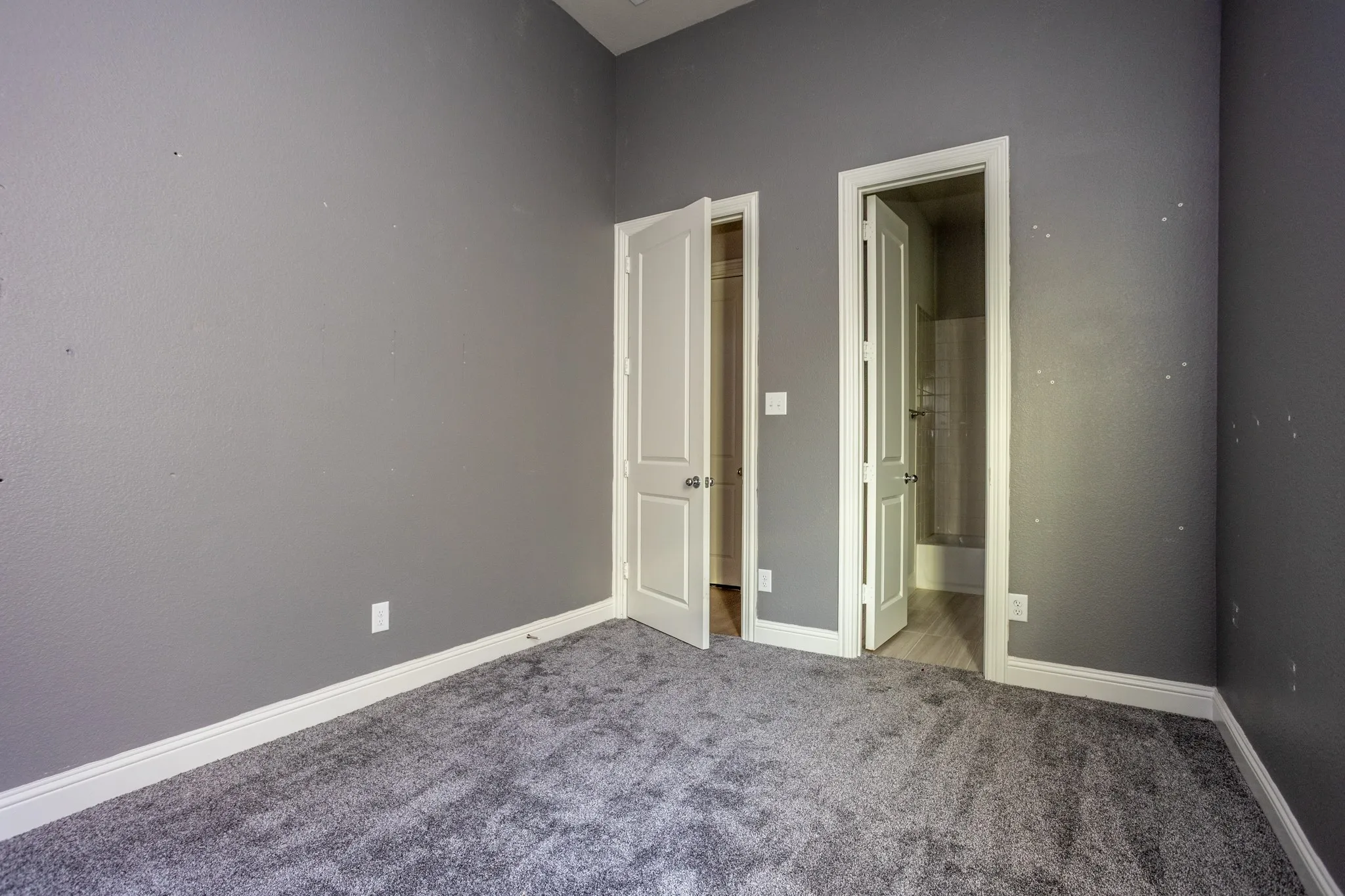 Secondary bedroom with ensuite bath