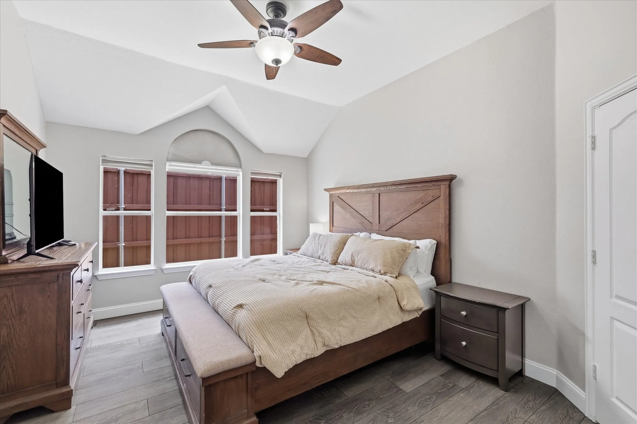 Primary Bedroom with King Bed and Dresser. Primary has 2 walk-in closets.