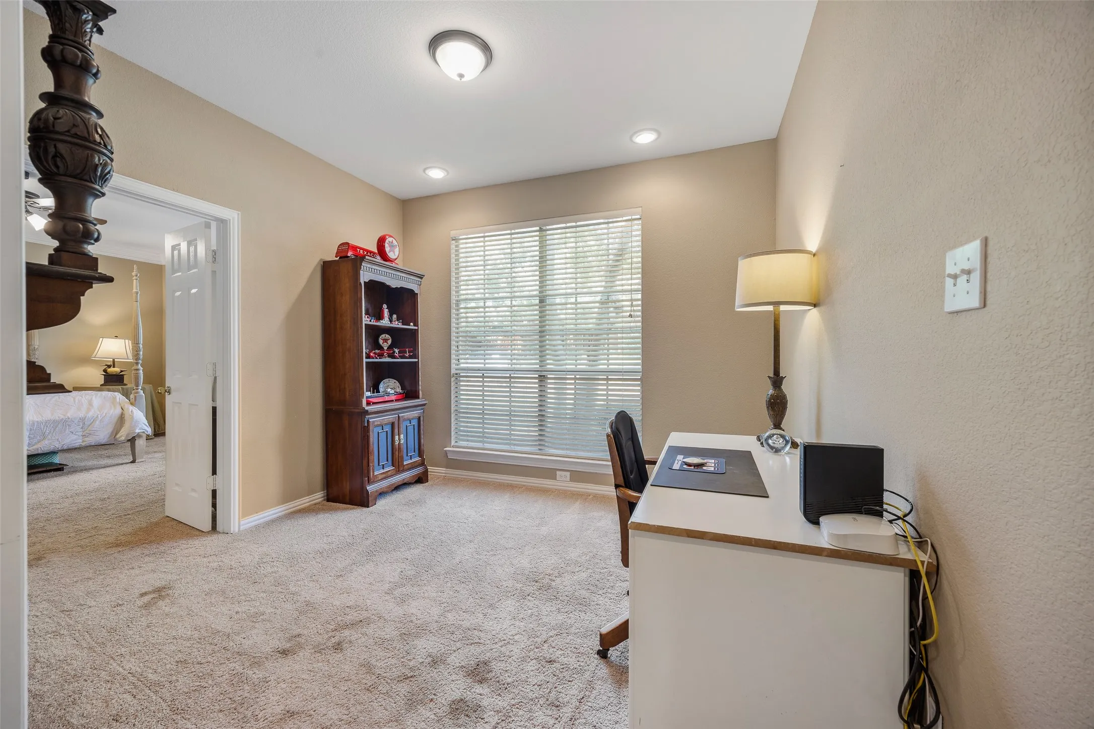 Primary suite's additional room within. Perfect office space!