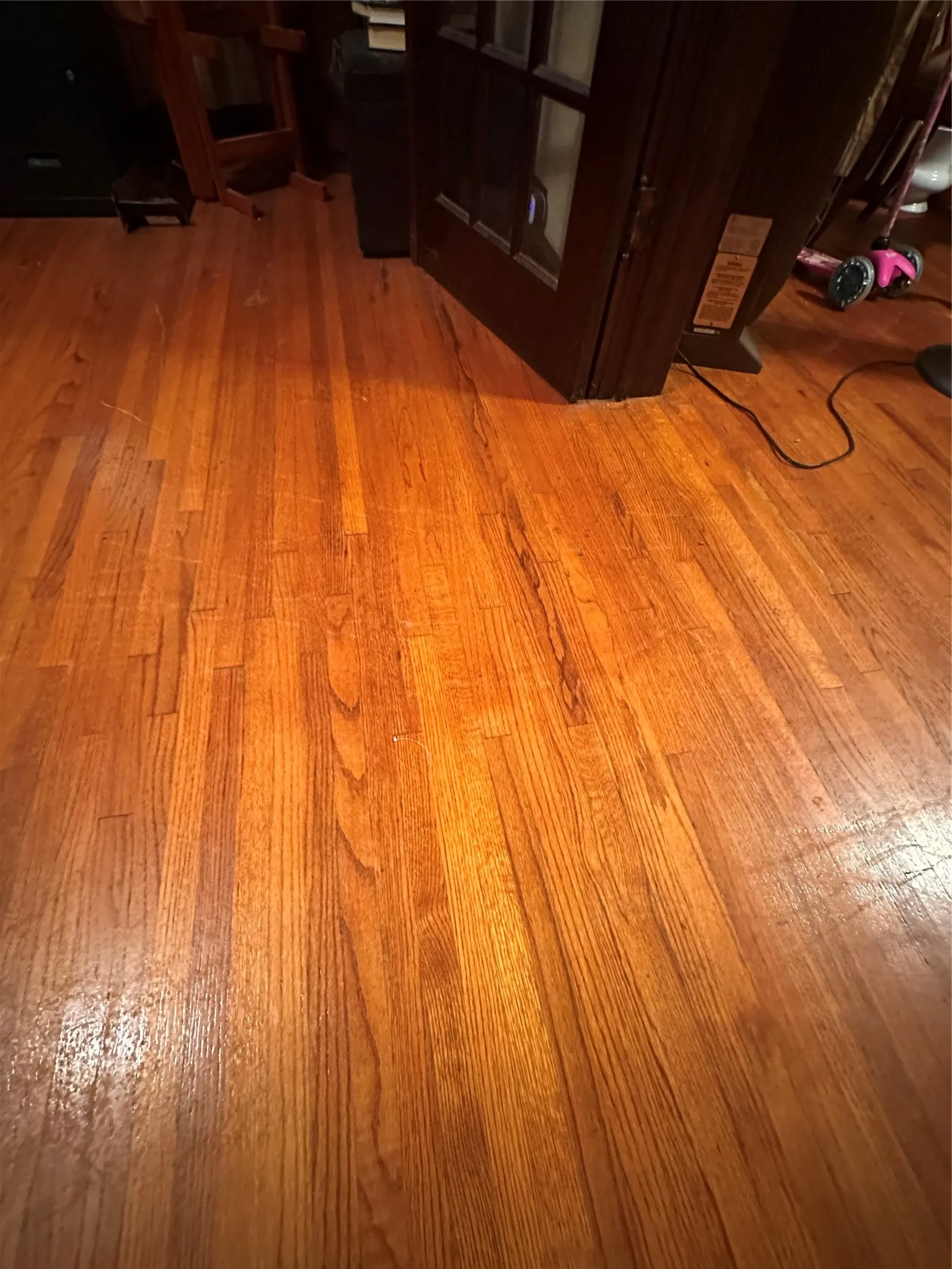 Warm wood-finish flooring with a polished surface
