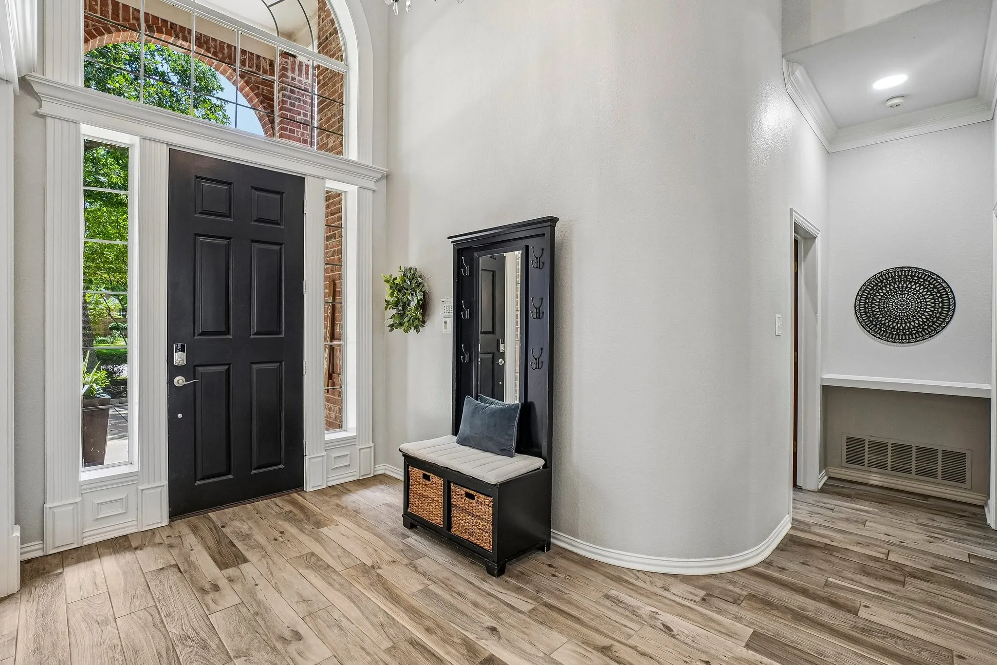 Entrance foyer with wood-look tile