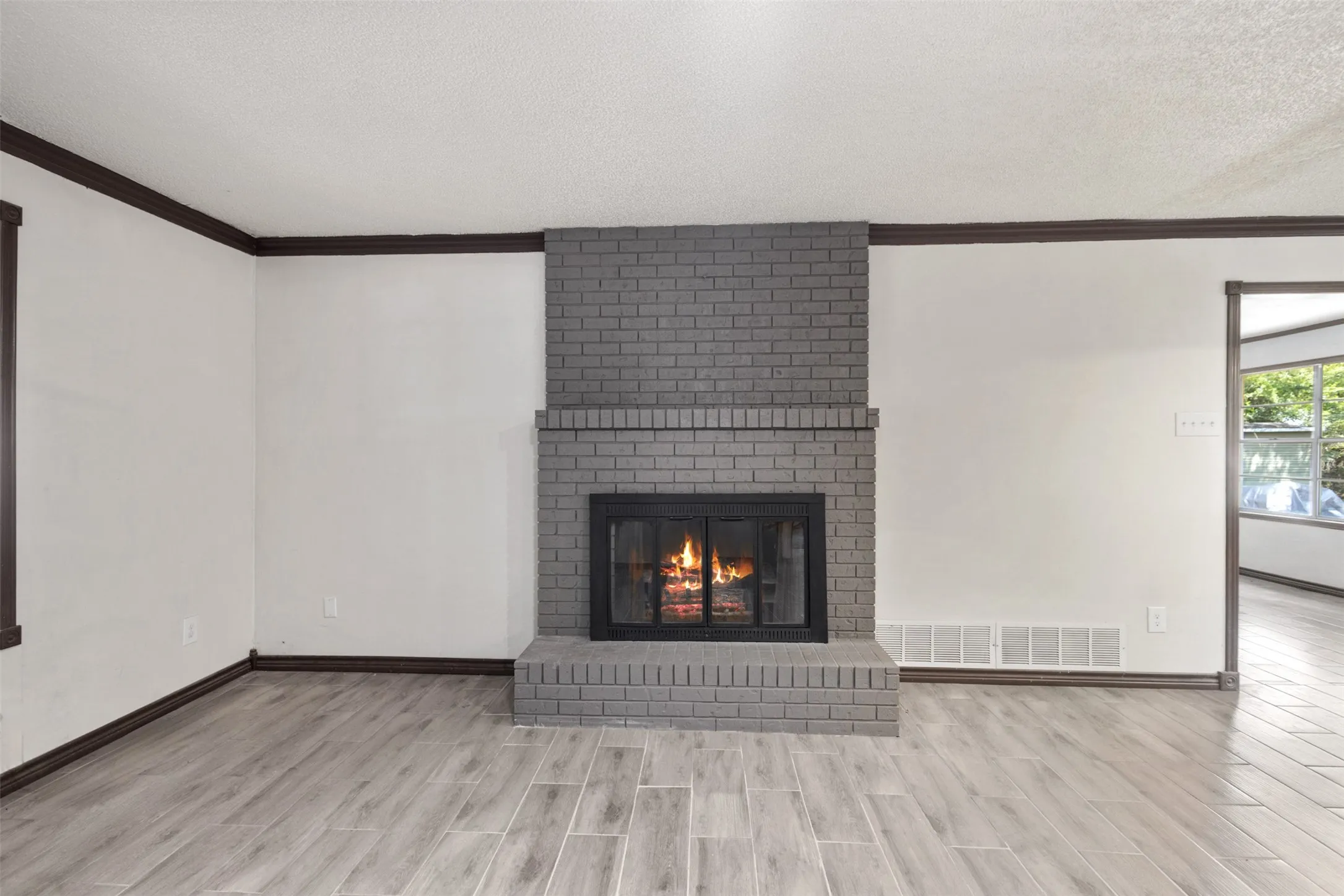 Living room with wood burning fireplace