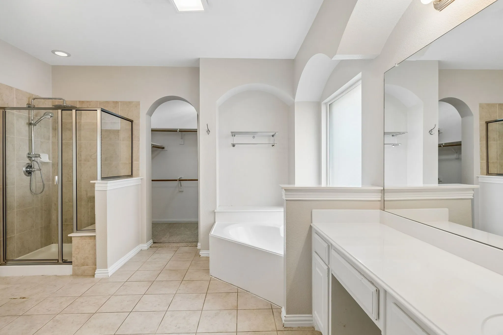 Shower and large walk in closet.