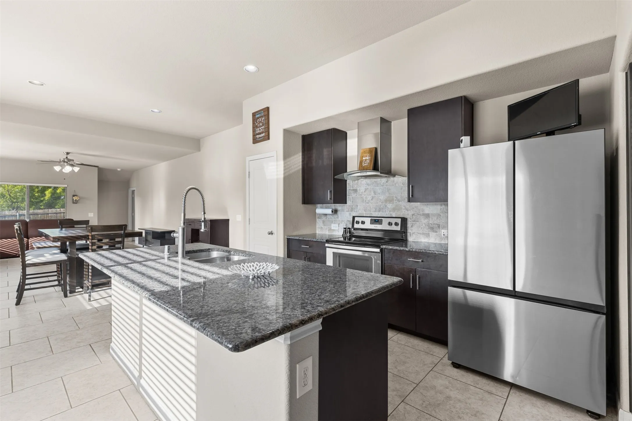 The kitchen island has so much prep space
