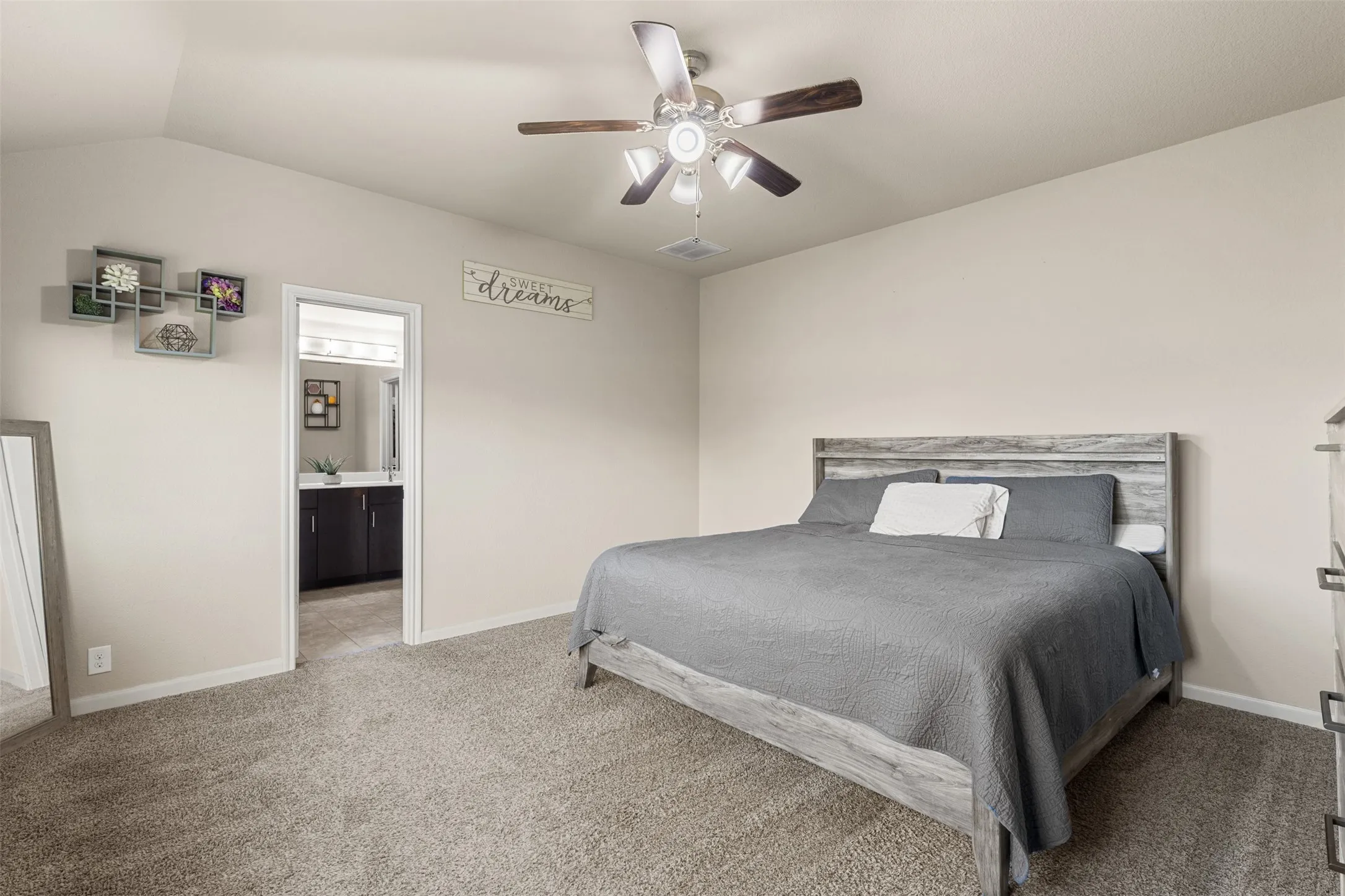 Features carpet, neutral paint and a ceiling fan
